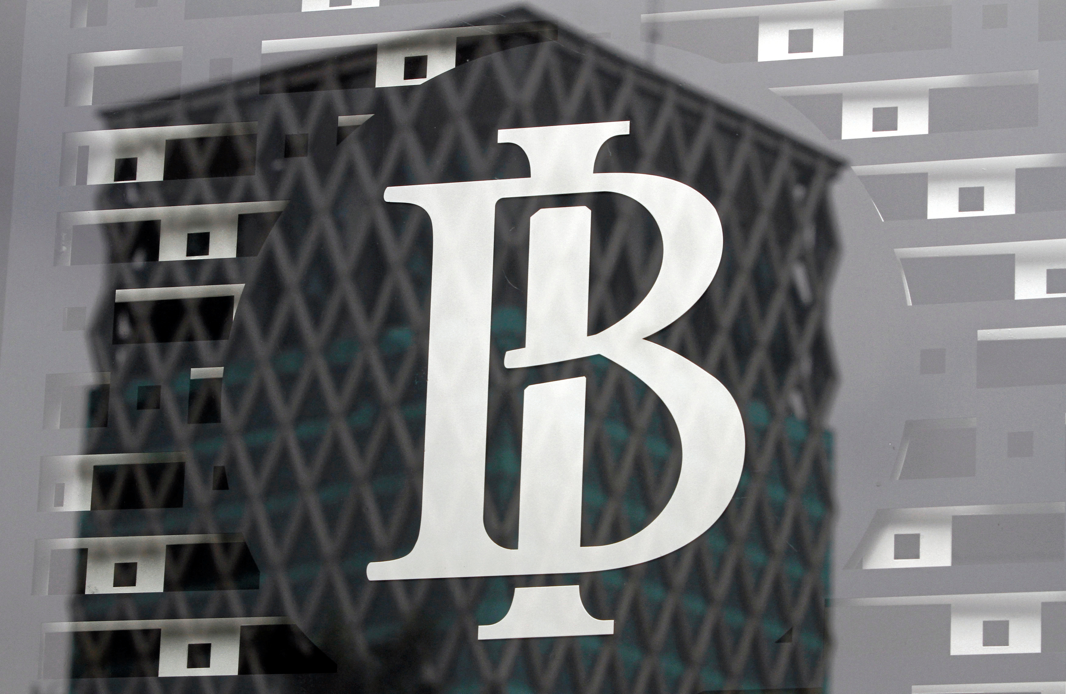 The logo of Indonesia's central bank, Bank Indonesia, is seen on a window in the bank's lobby in Jakarta, Indonesia