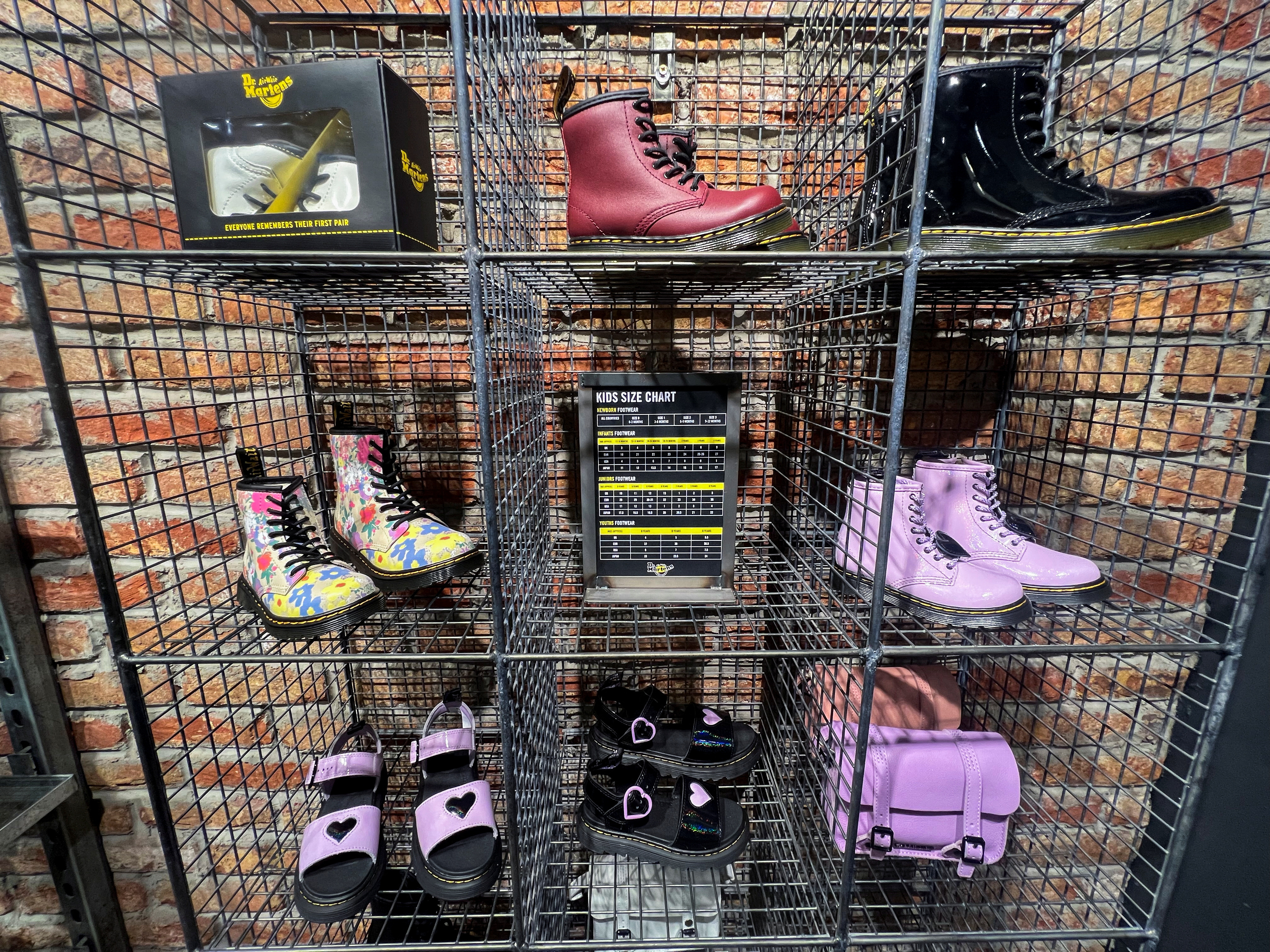 Dr. Martens shoes are displayed inside a shop in Manchester