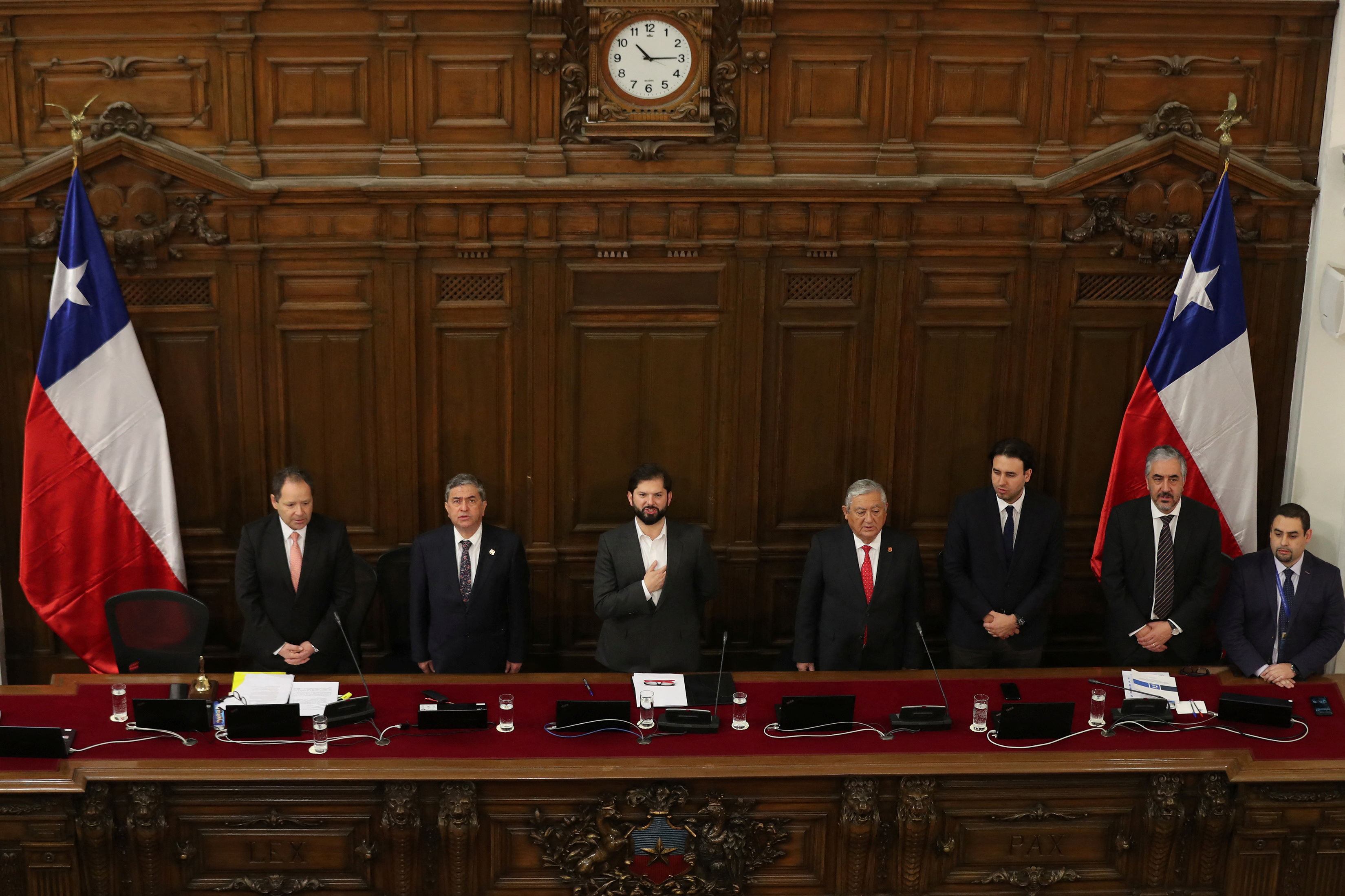 New constitutional council members gather for the first session to draft a new constitution in Santiago