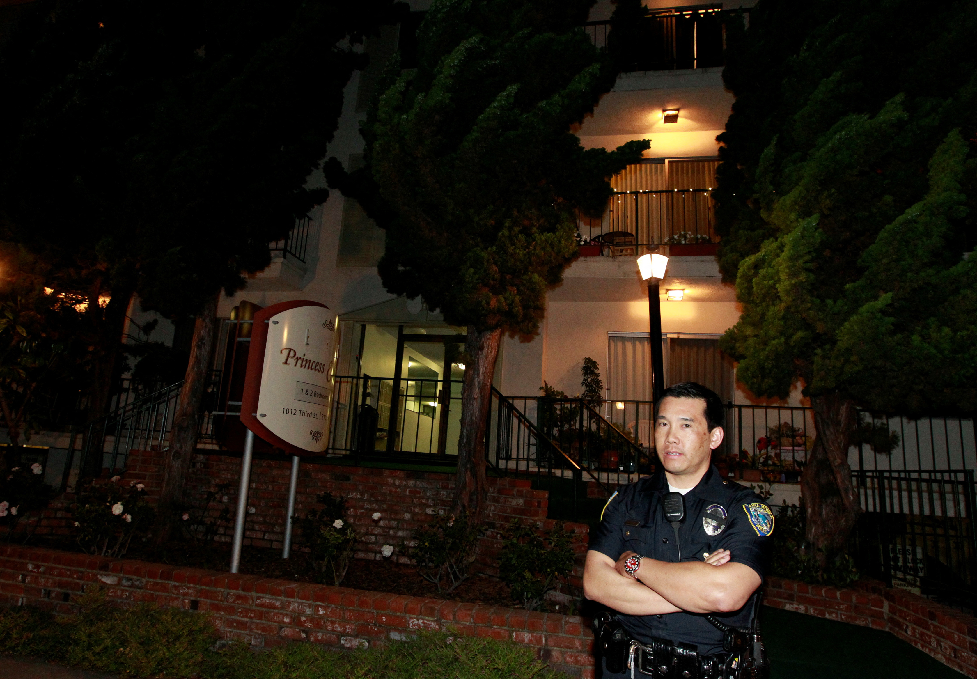 A policeman stands outside the apartment building where accused Boston crime boss James "Whitey" Bulger was arrested in Santa Monica, California
