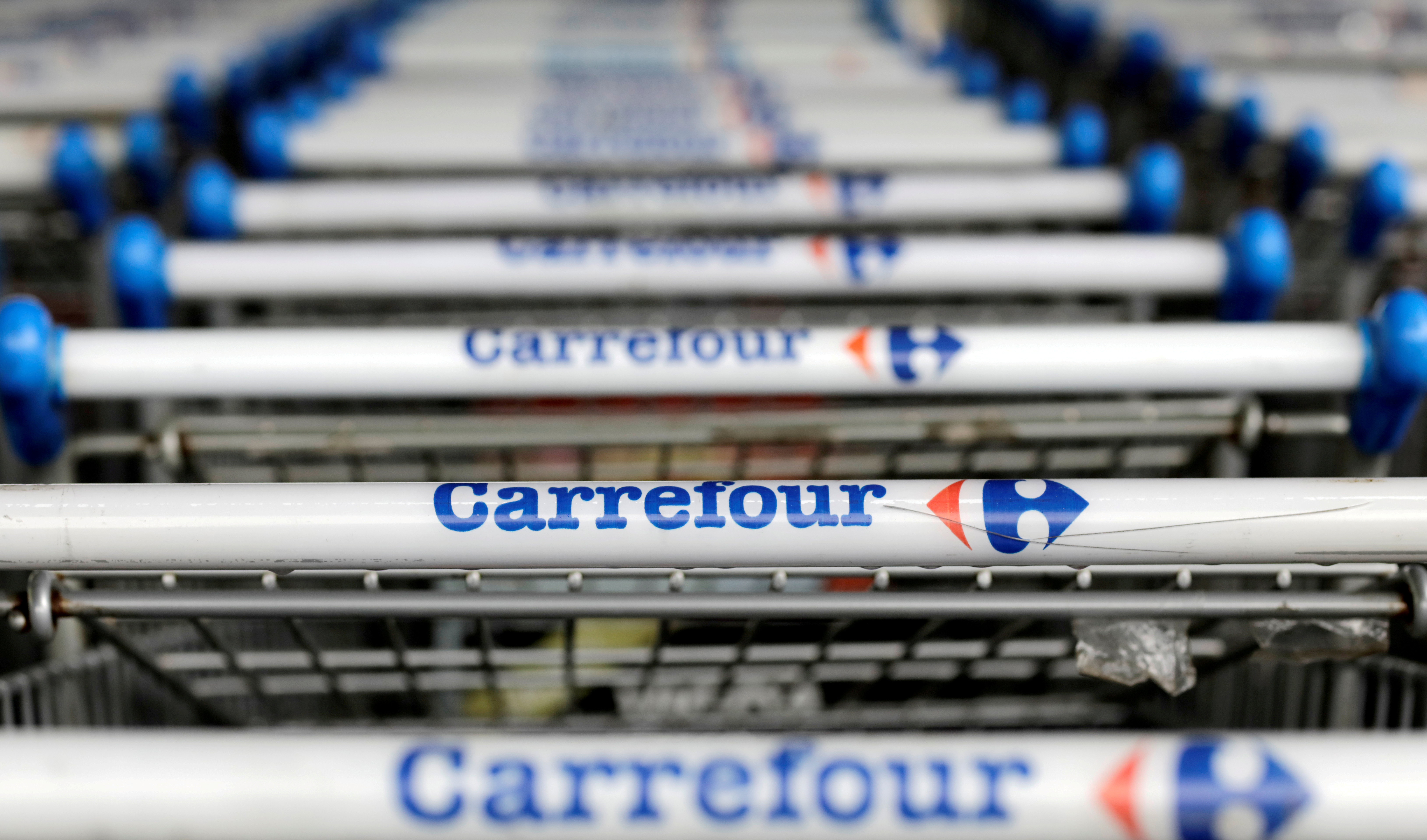 The logo of French retailer Carrefour on shopping trolleys in Sao Paulo