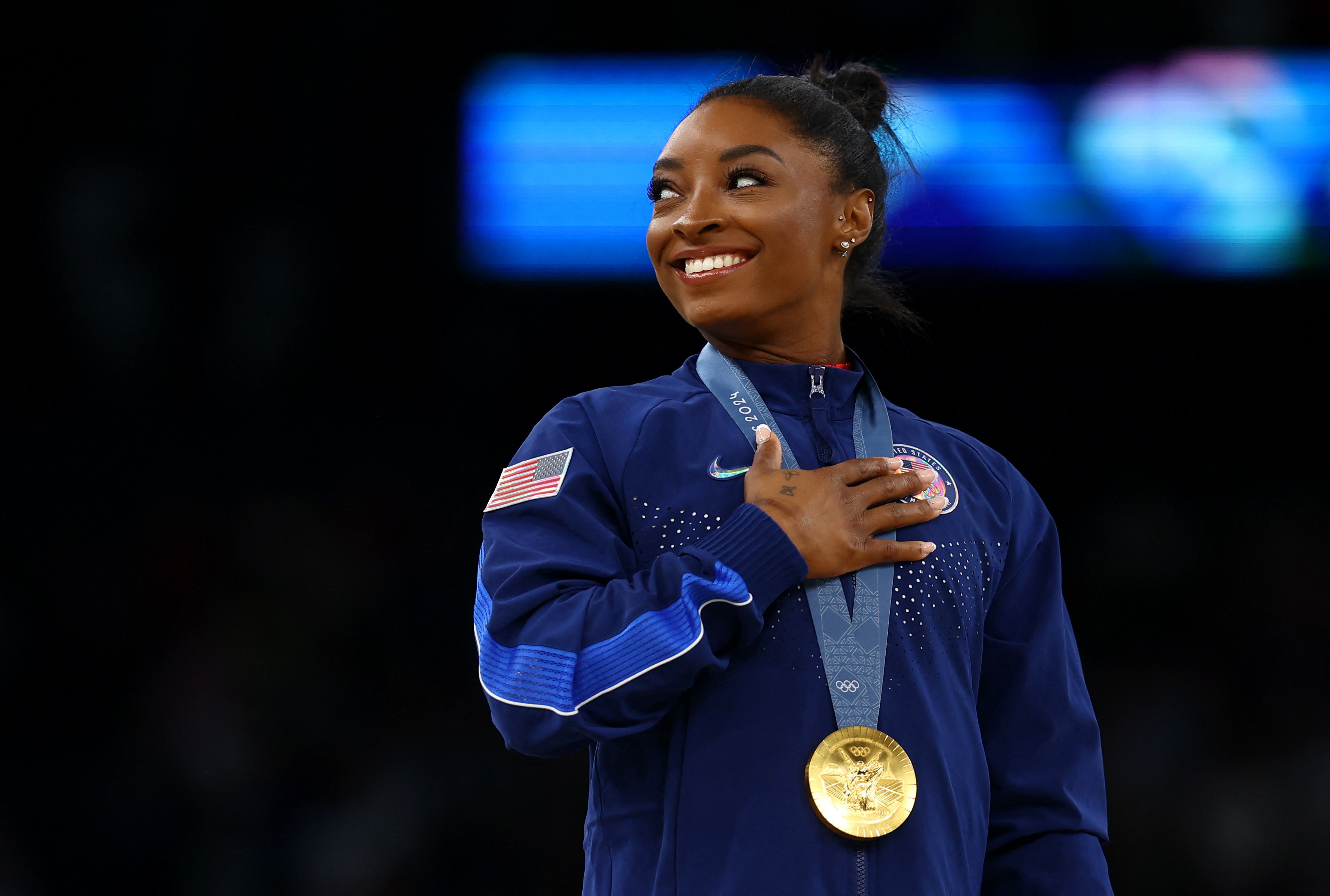 Simone Biles looks to join Ledecky with nine Olympic golds | Reuters