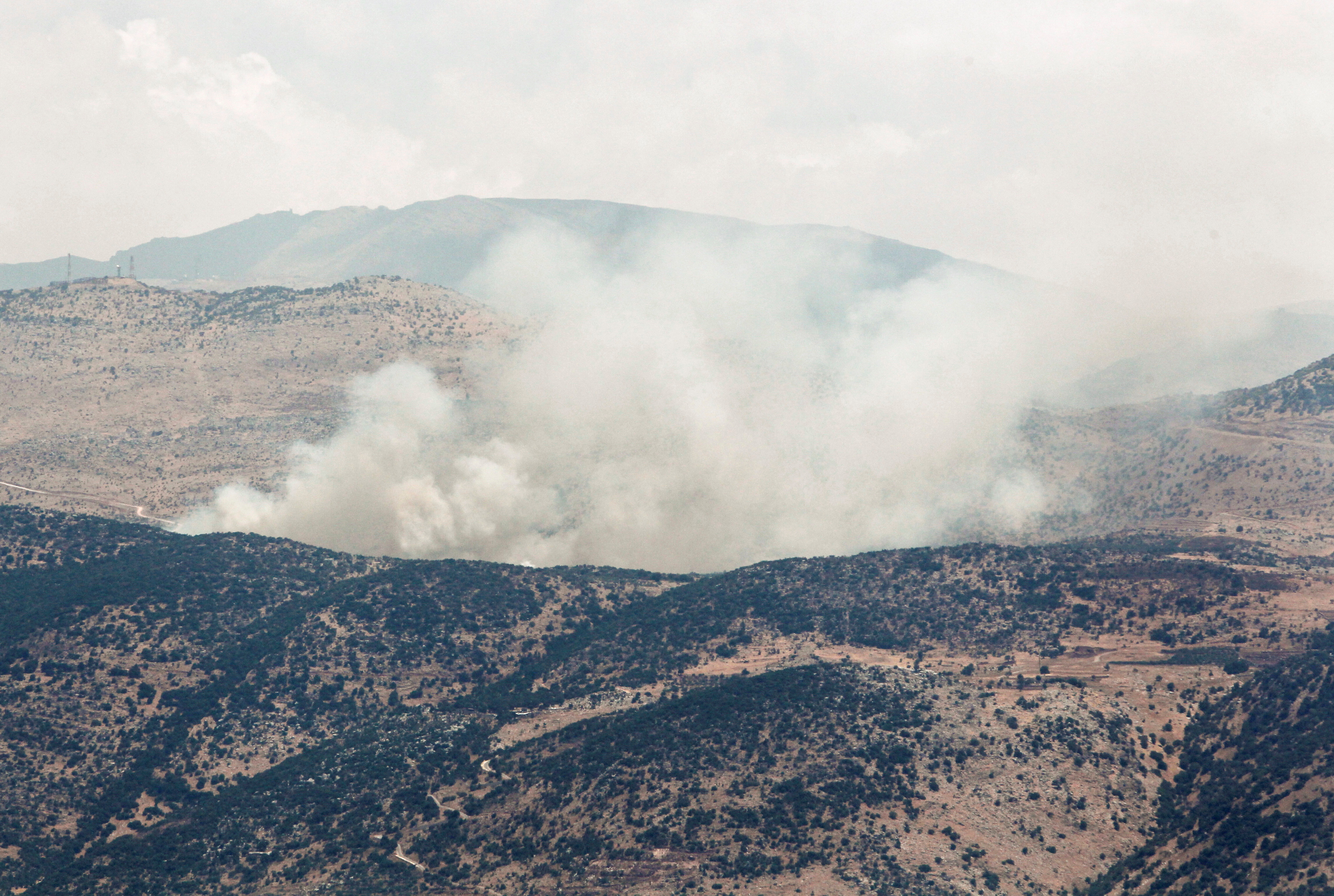 Smoke rises as seen from the village of Wazzani, near the Lebanese-Israeli border