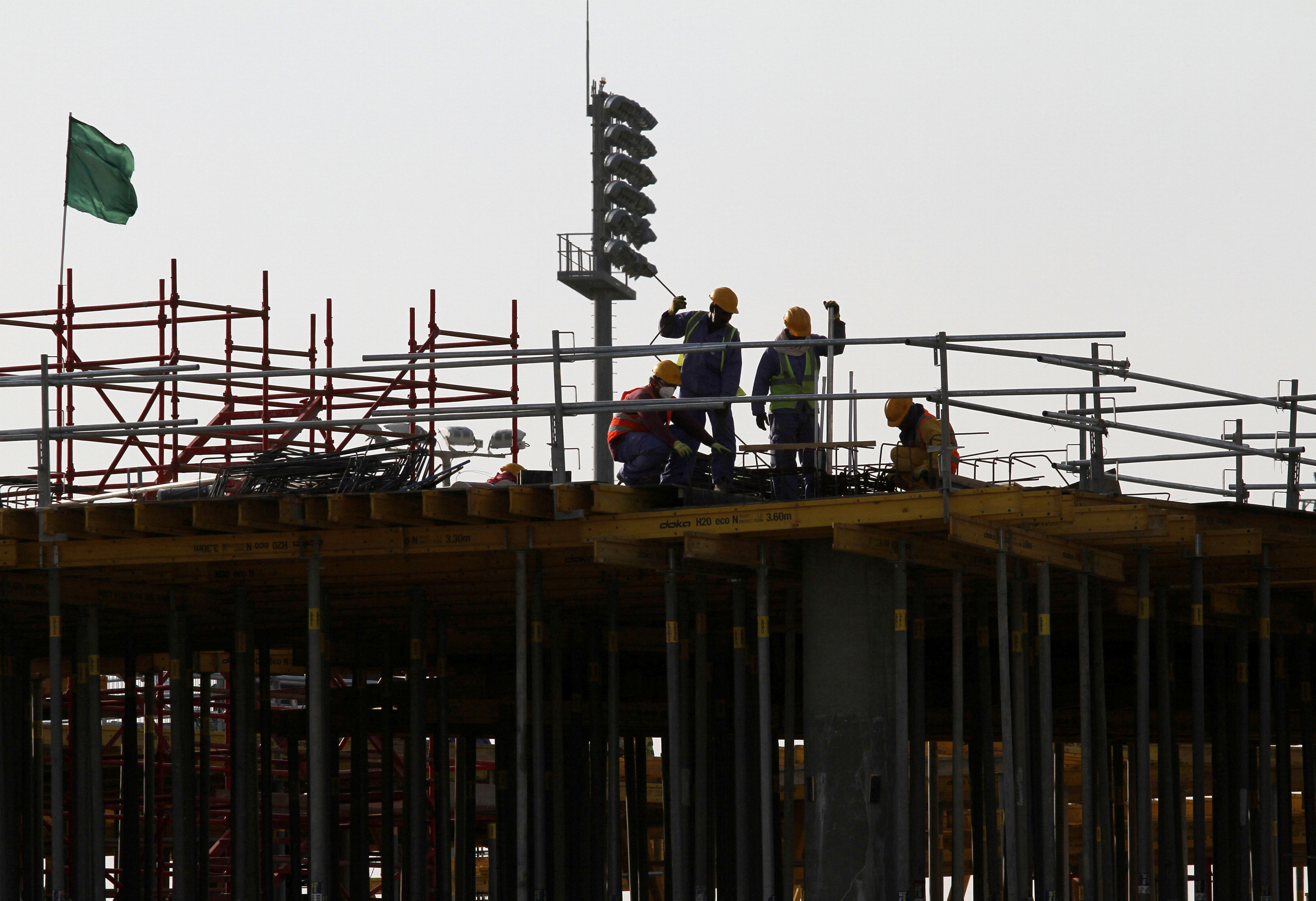 Migrant labourers work at a construction site at the Aspire Zone in Doha, Qatar, on March 26, 2016. REUTERS/Naseem Zeitoon/File Photo