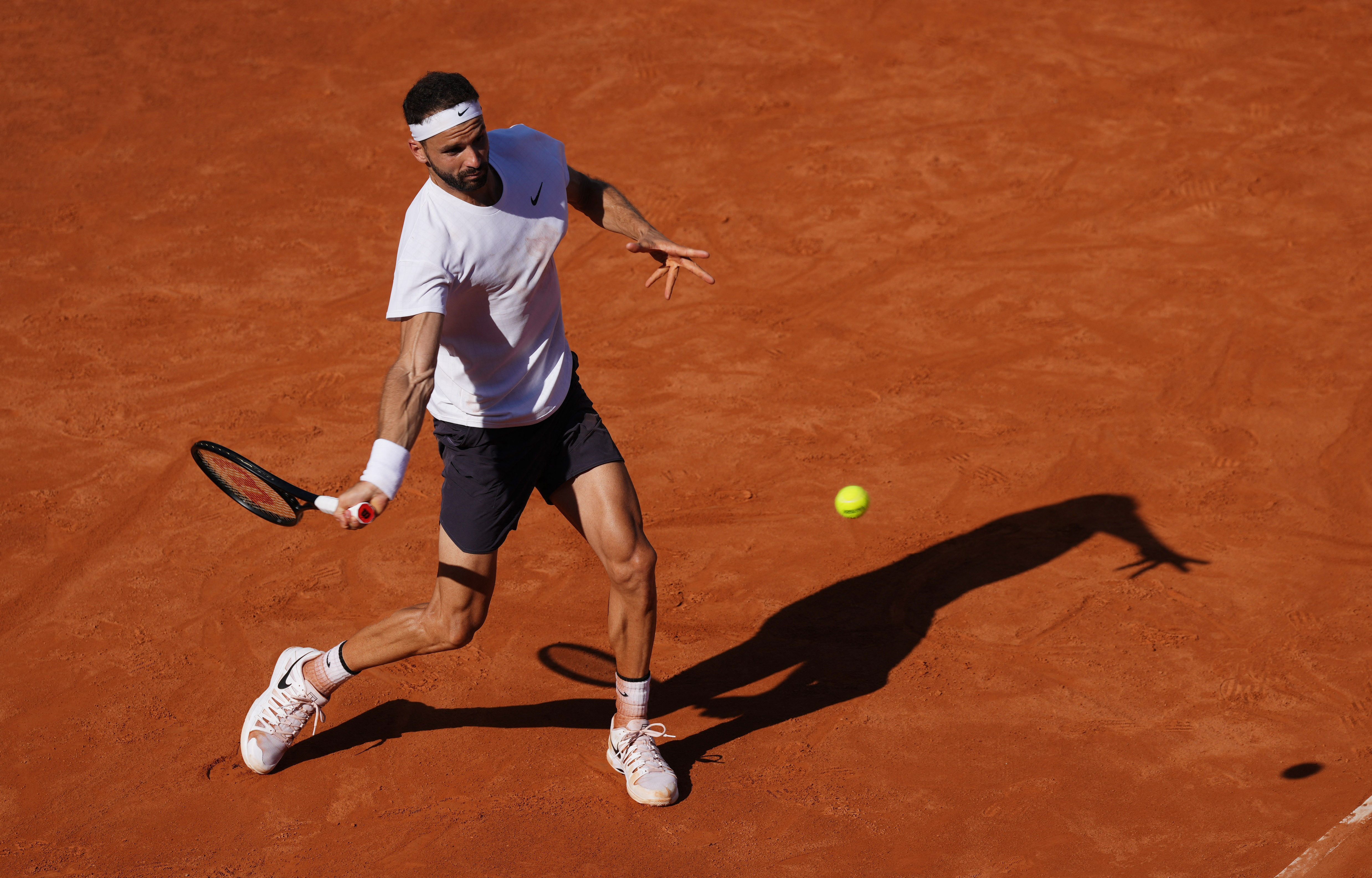 Djokovic battles past Dimitrov in Rome, Swiatek cruises Reuters
