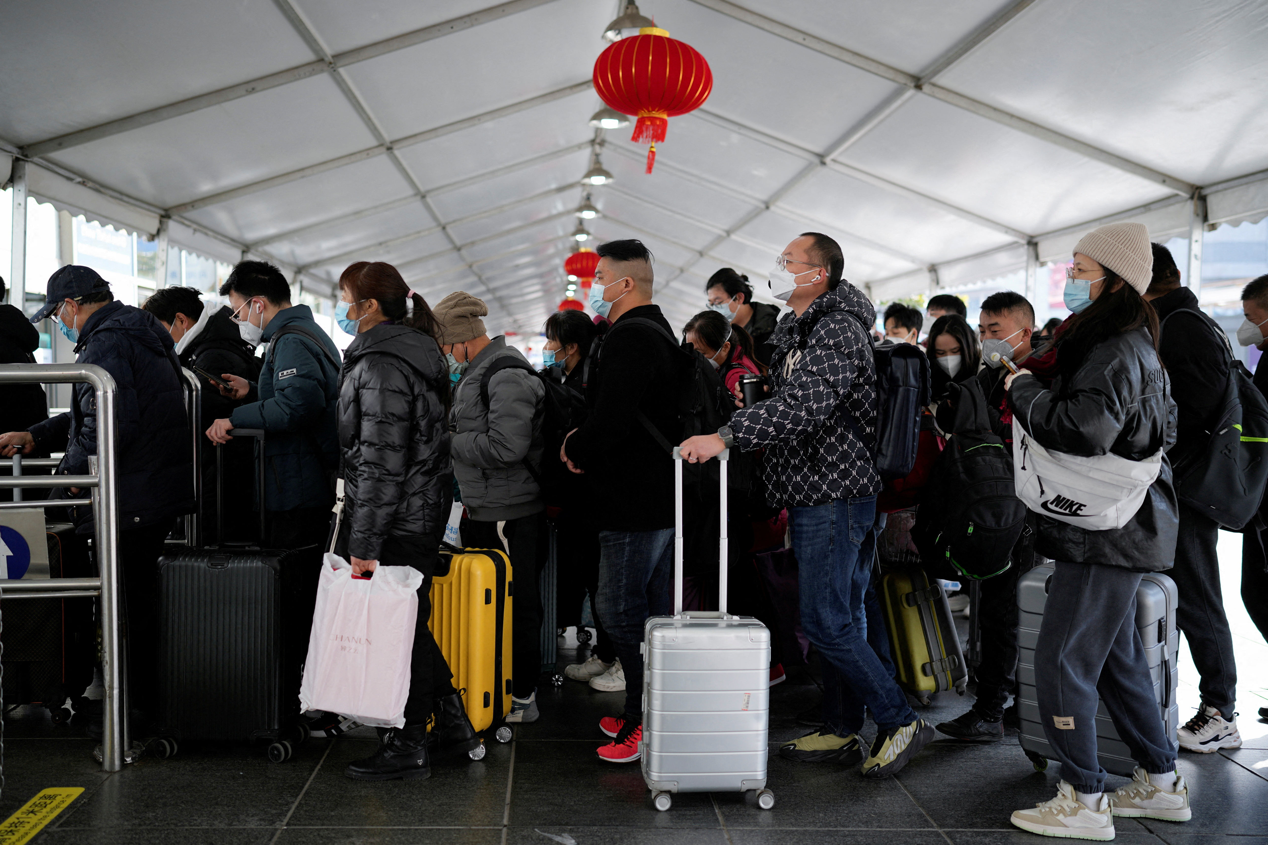 People travel during annual Spring Festival travel rush, ahead of the Chinese Lunar New Year, in Shanghai