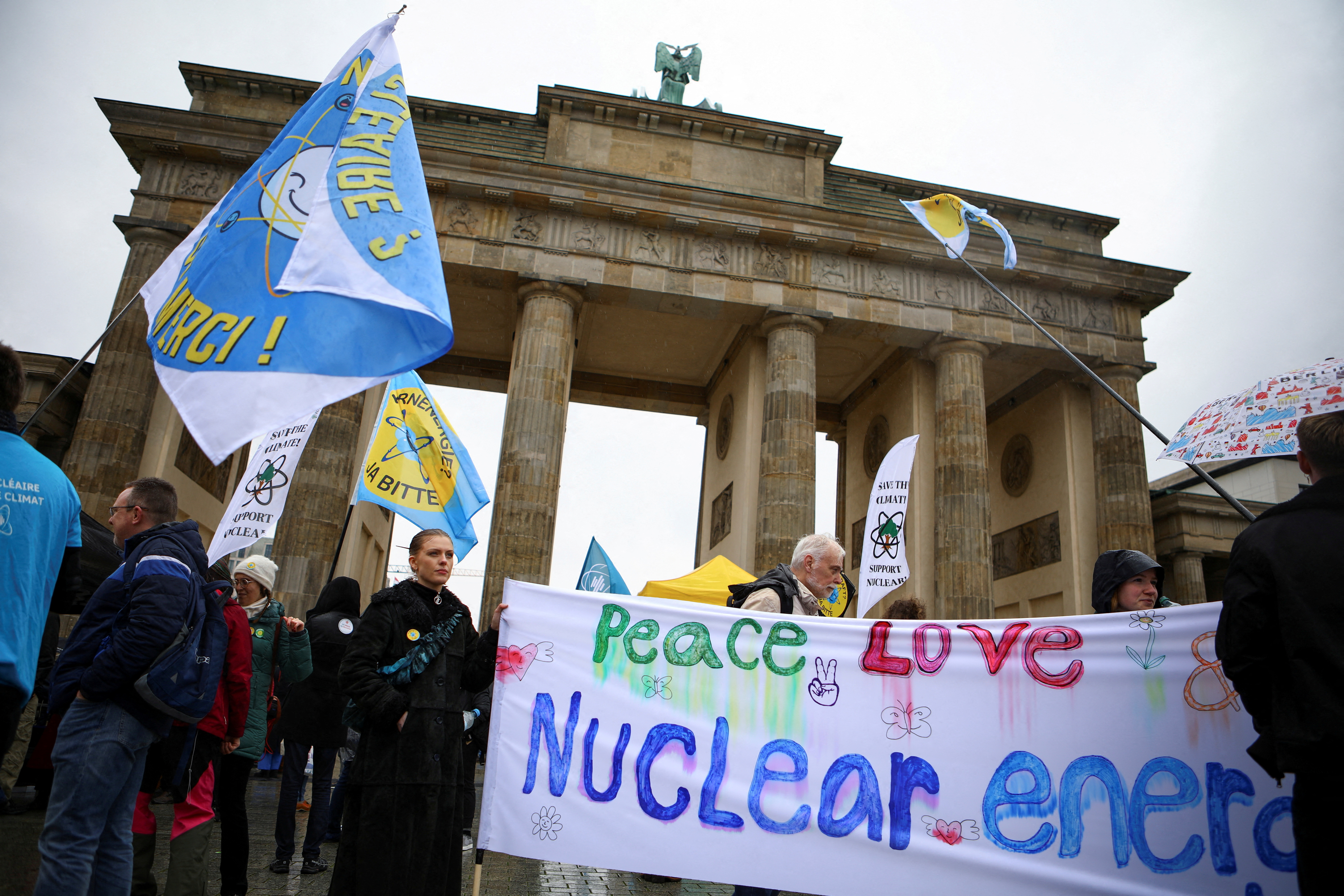 People protest as Germany shuts down its last three nuclear power plants in Berlin