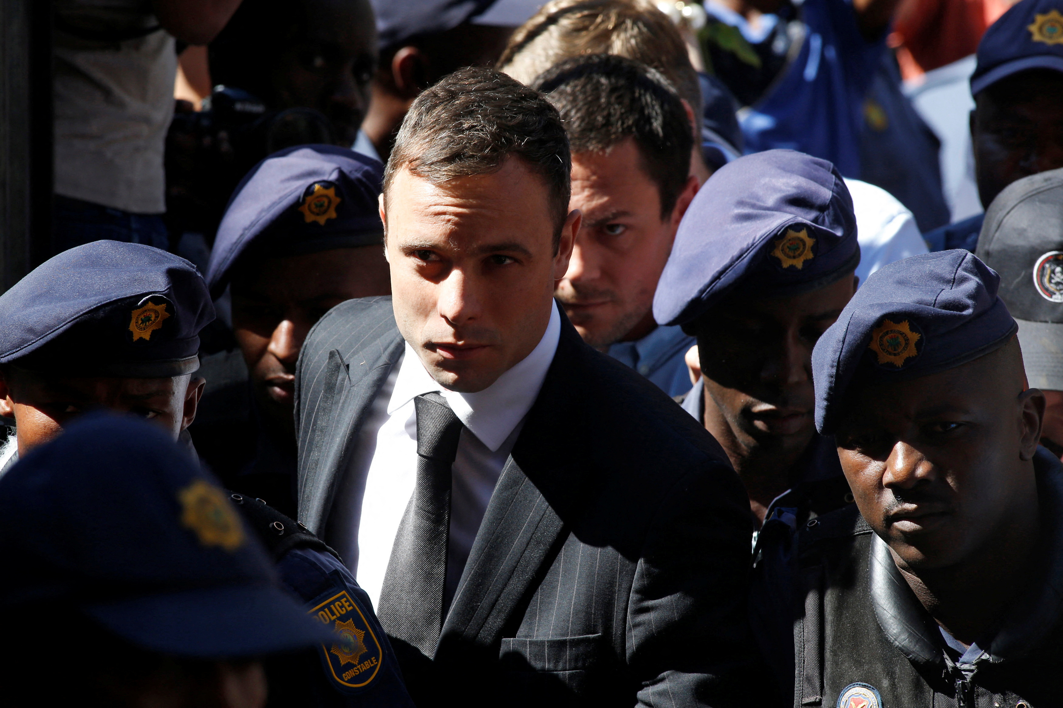 South African Olympic and Paralympic sprinter Pistorius arrives at the North Gauteng High Court in Pretoria
