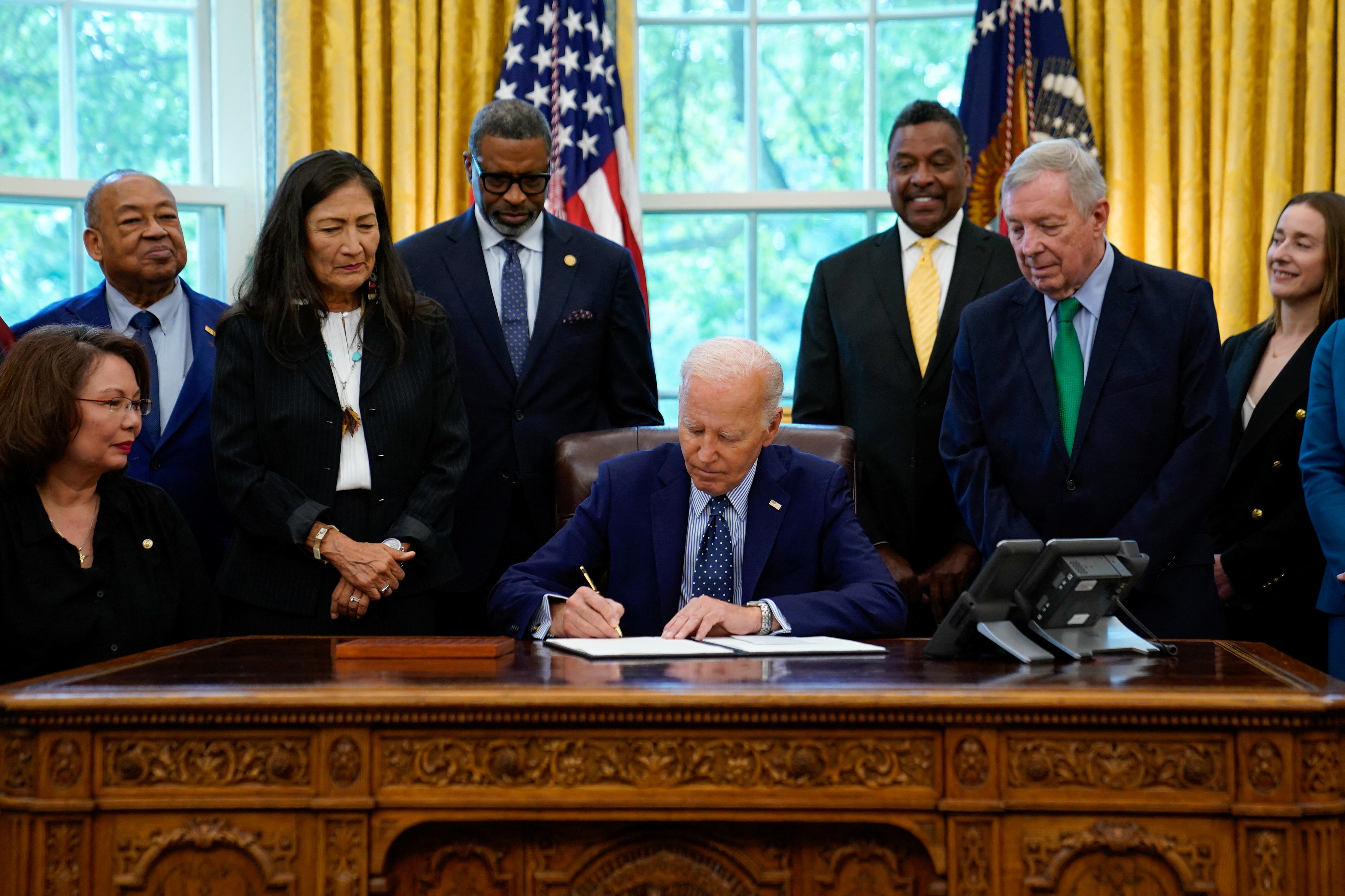 U.S. President Joe Biden signs a proclamation to designate the Springfield 1908 Race Riot National Monument