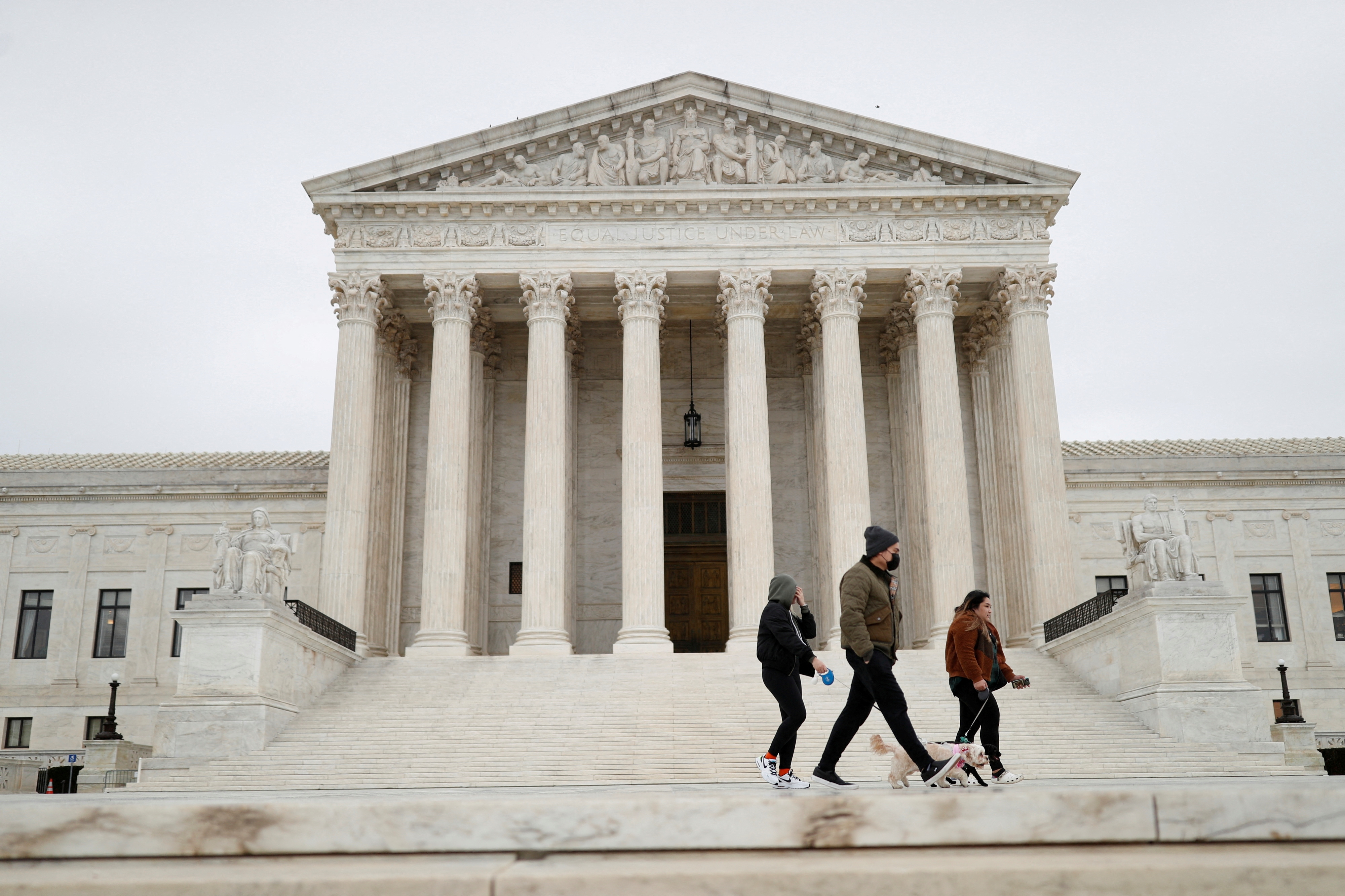 Supreme Court justices question U.S. power to curb carbon emissions |  Reuters