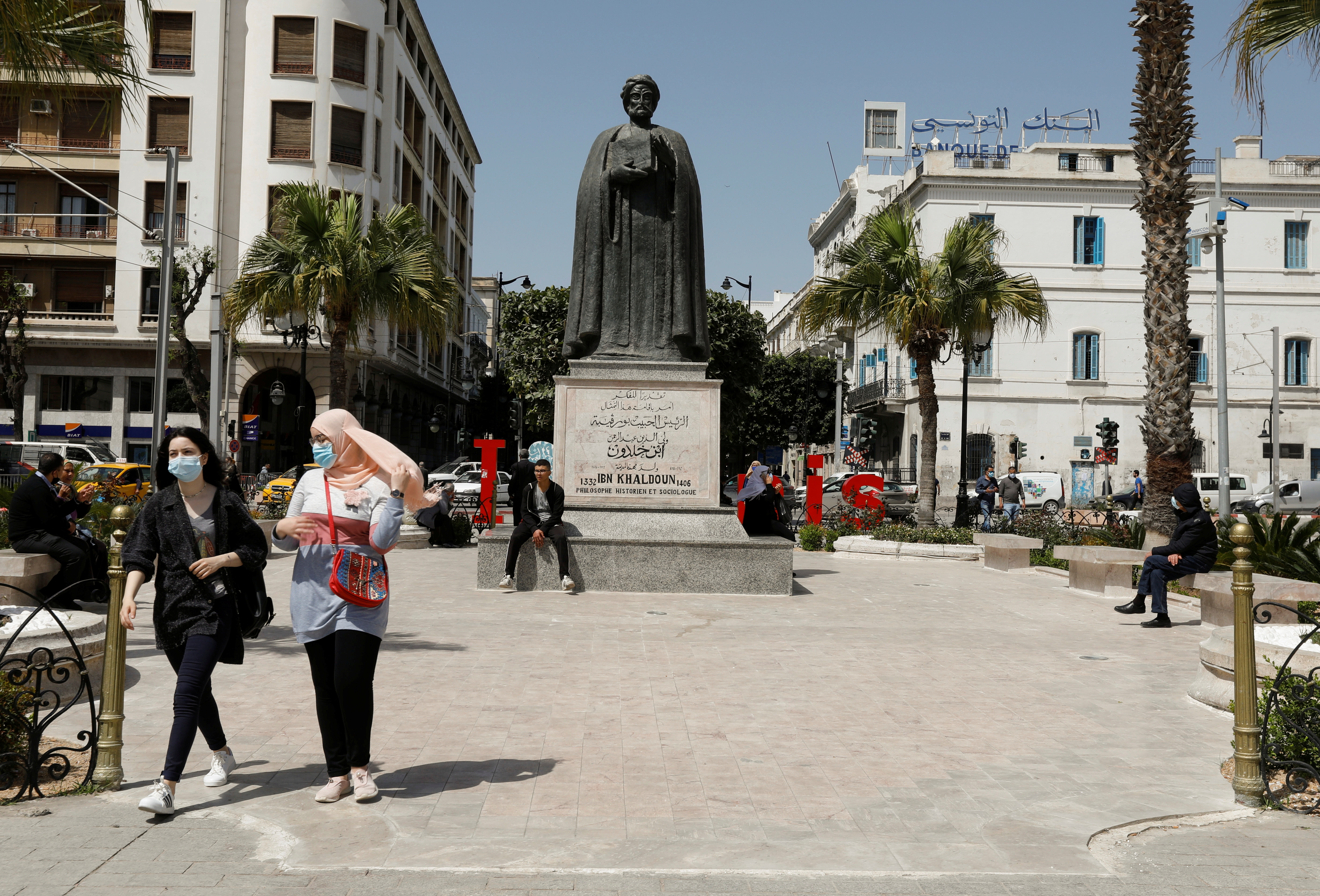 People walk in the center of Tunis
