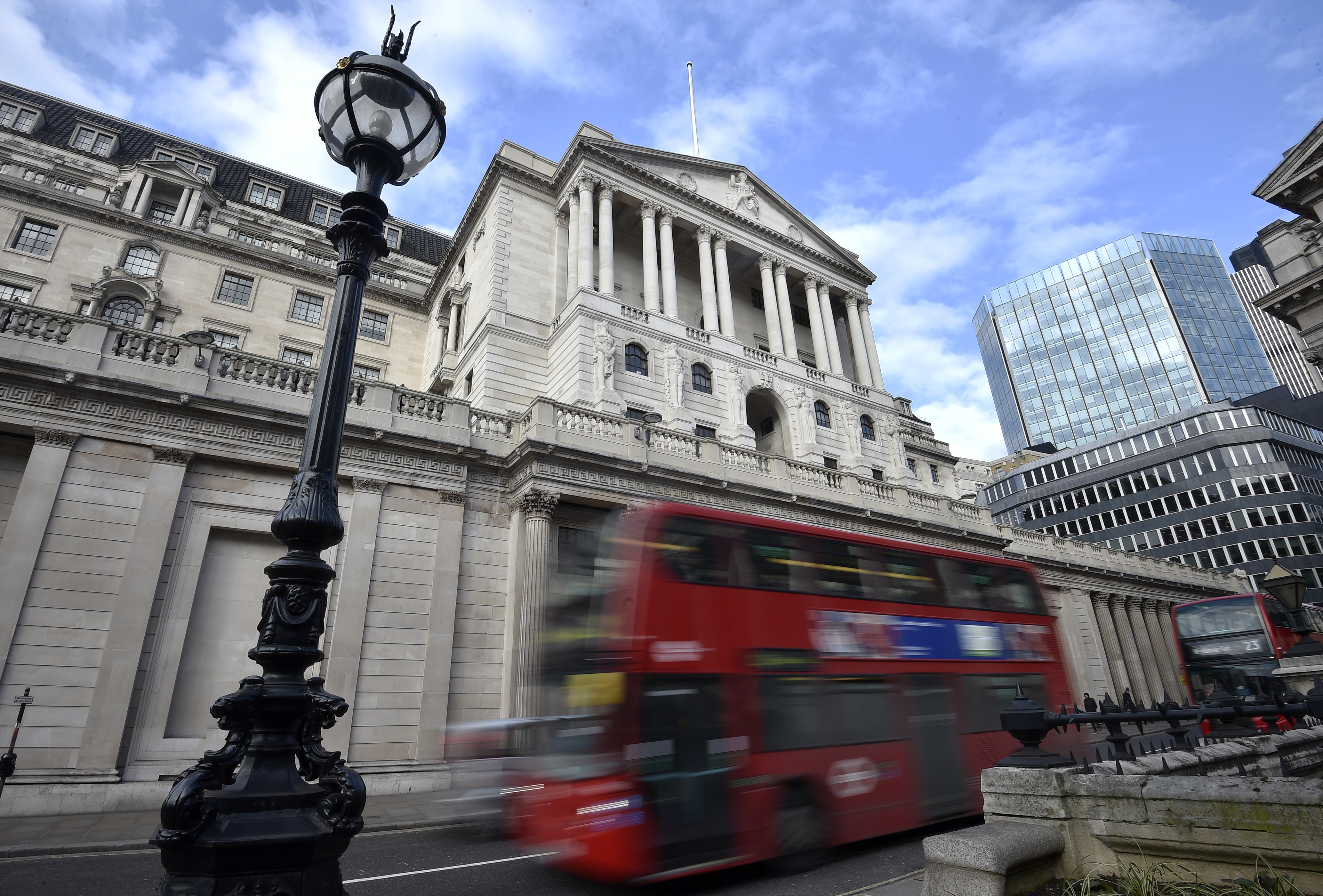 A bus passes the Bank of England in the City of London