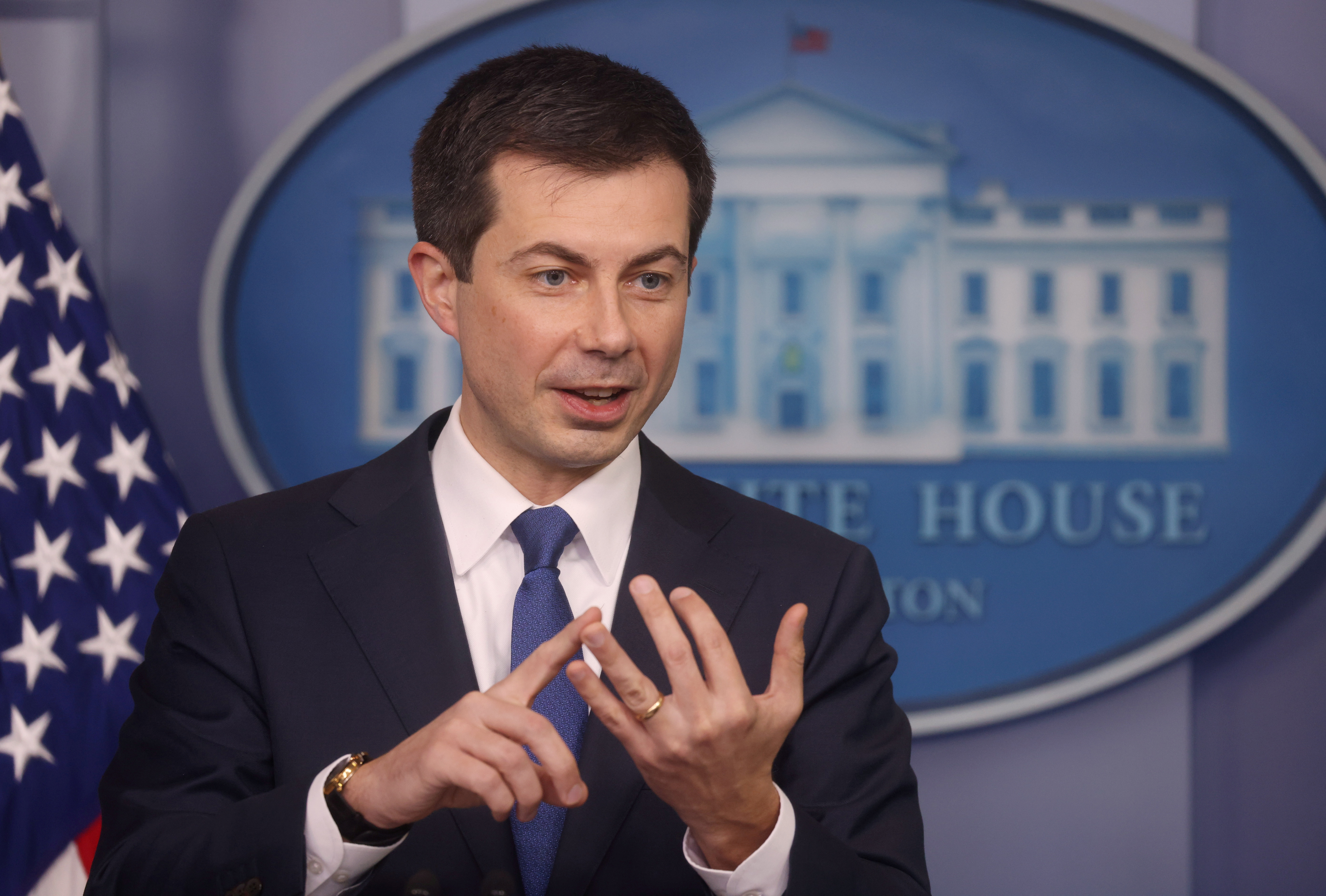 U.S. Secretary of Transportation Pete Buttigieg speaks to the news media during a press briefing at the White House in Washington
