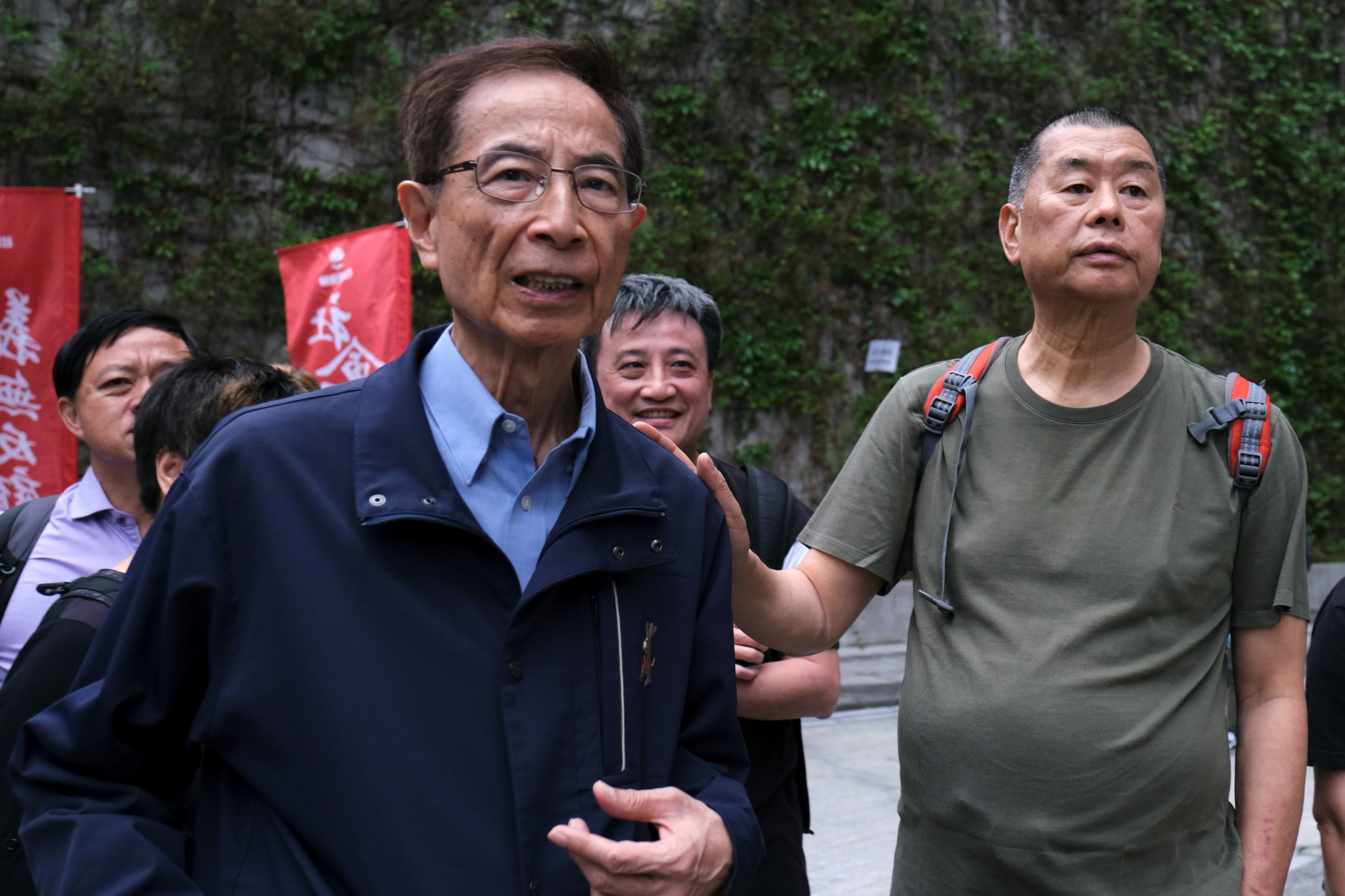 Hong Kong politician Martin Lee and Founder of Next Media Jimmy Lai march during a protest to demand authorities scrap a proposed extradition bill with China, in Hong Kong