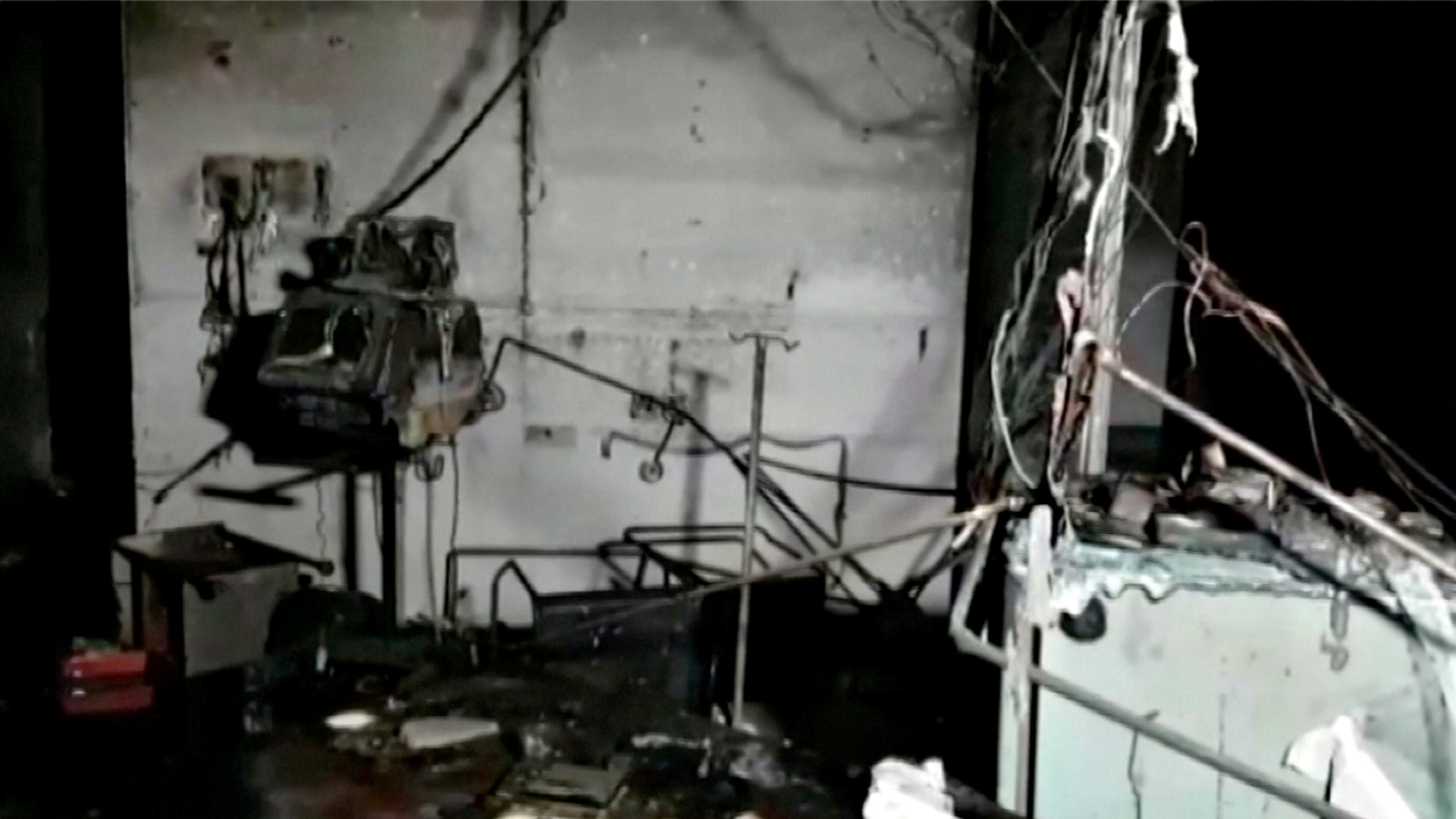 Video grab of damaged equipment and furniture in the burnt interior of a hospital treating coronavirus disease (COVID-19) patients, after a deadly fire, in India's western Gujarat state