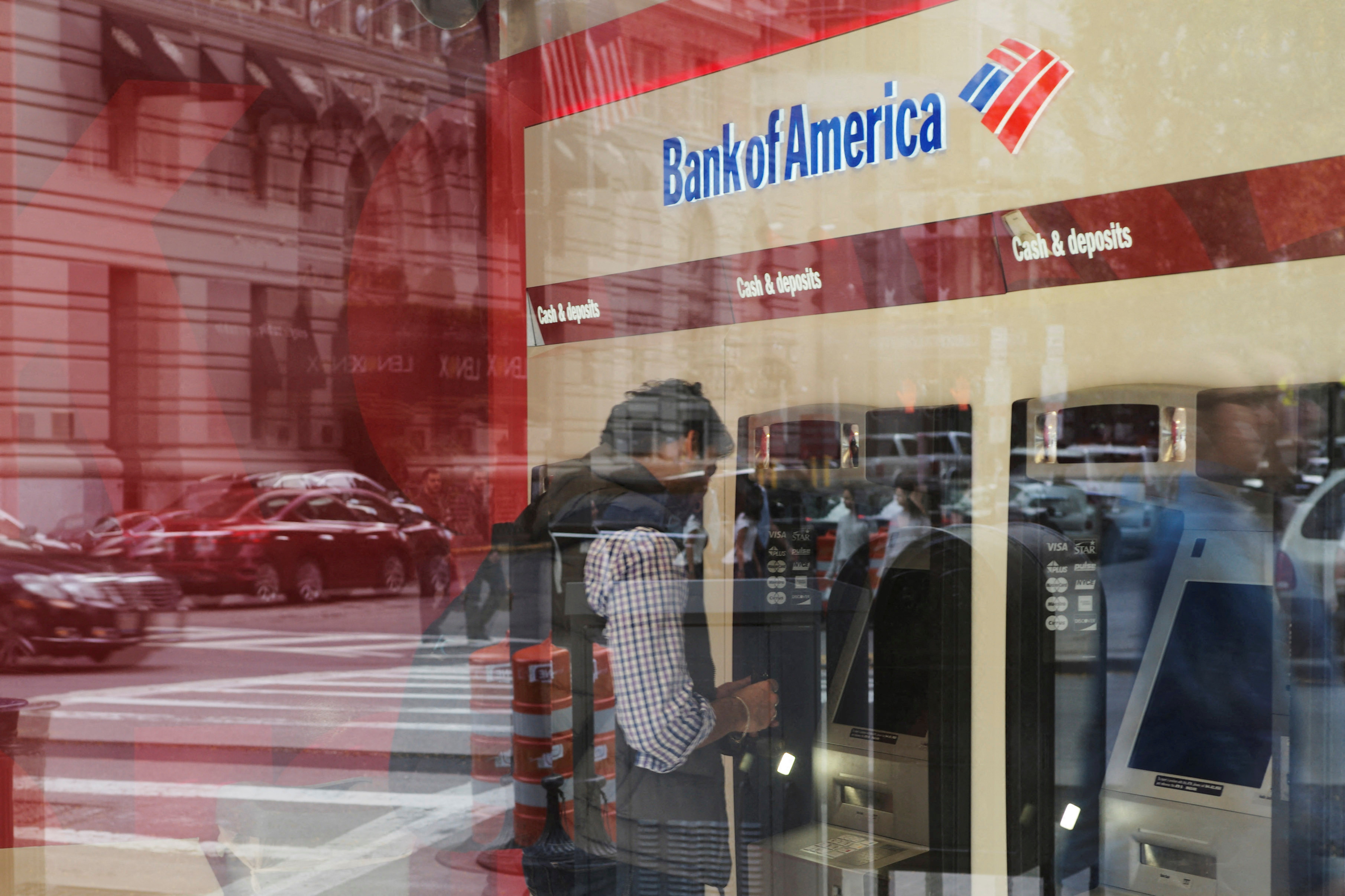 Customer uses an ATM at a Bank of America branch in Boston