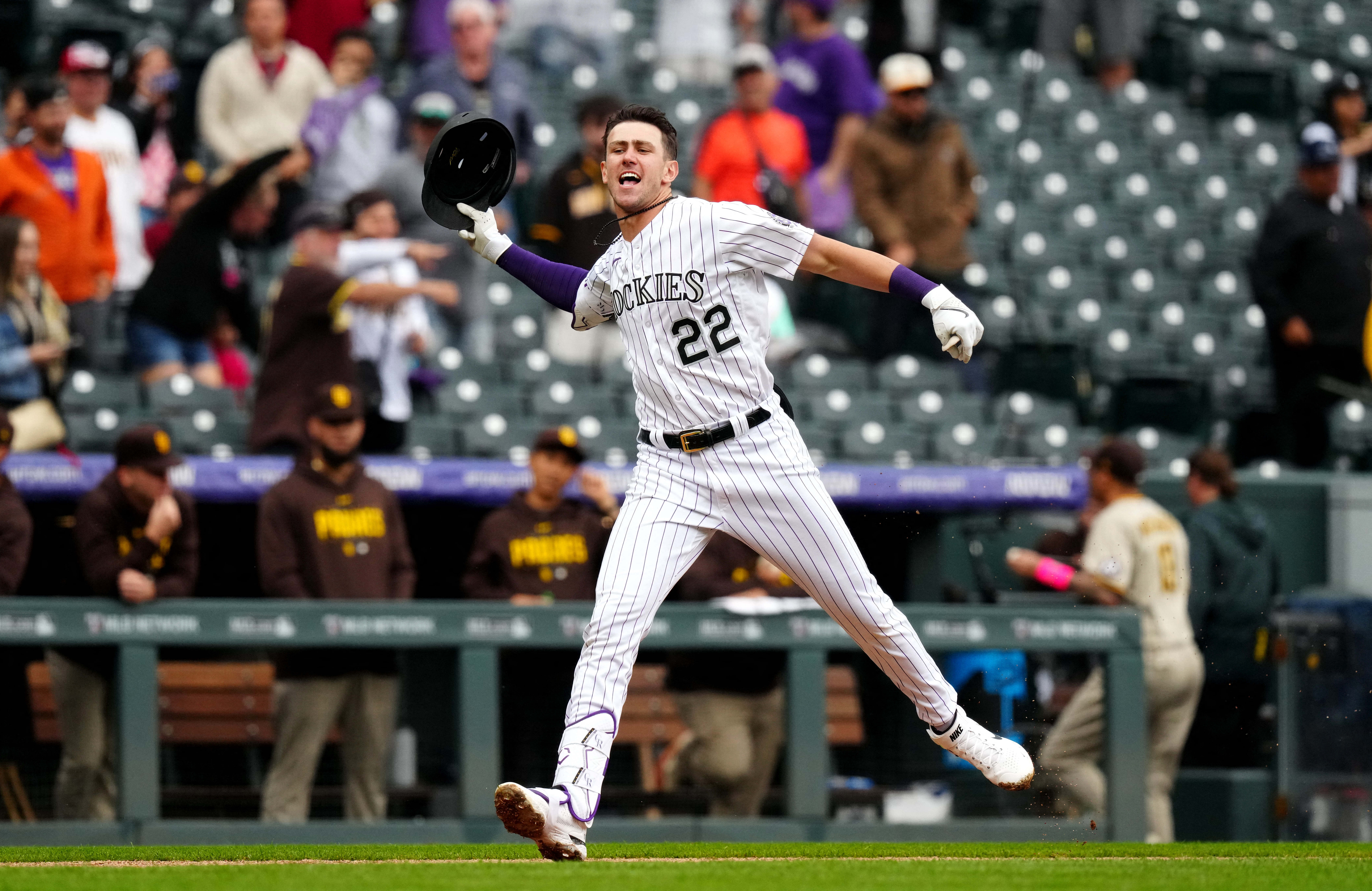 Rockies belt two ninth-inning HRs -- more than an hour apart -- to