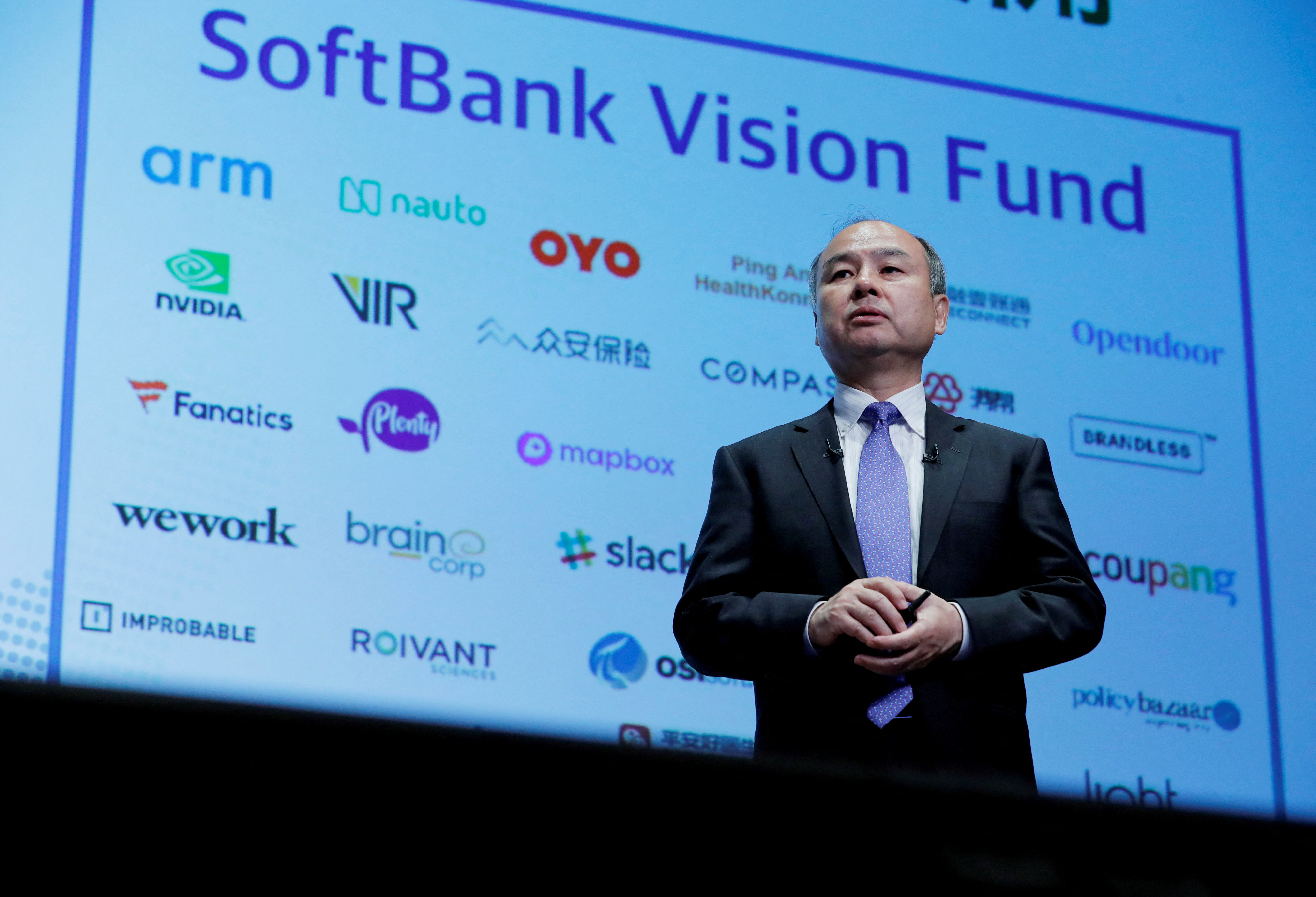 Japan's SoftBank Group Corp Chief Executive Masayoshi Son attends a news conference in Tokyo