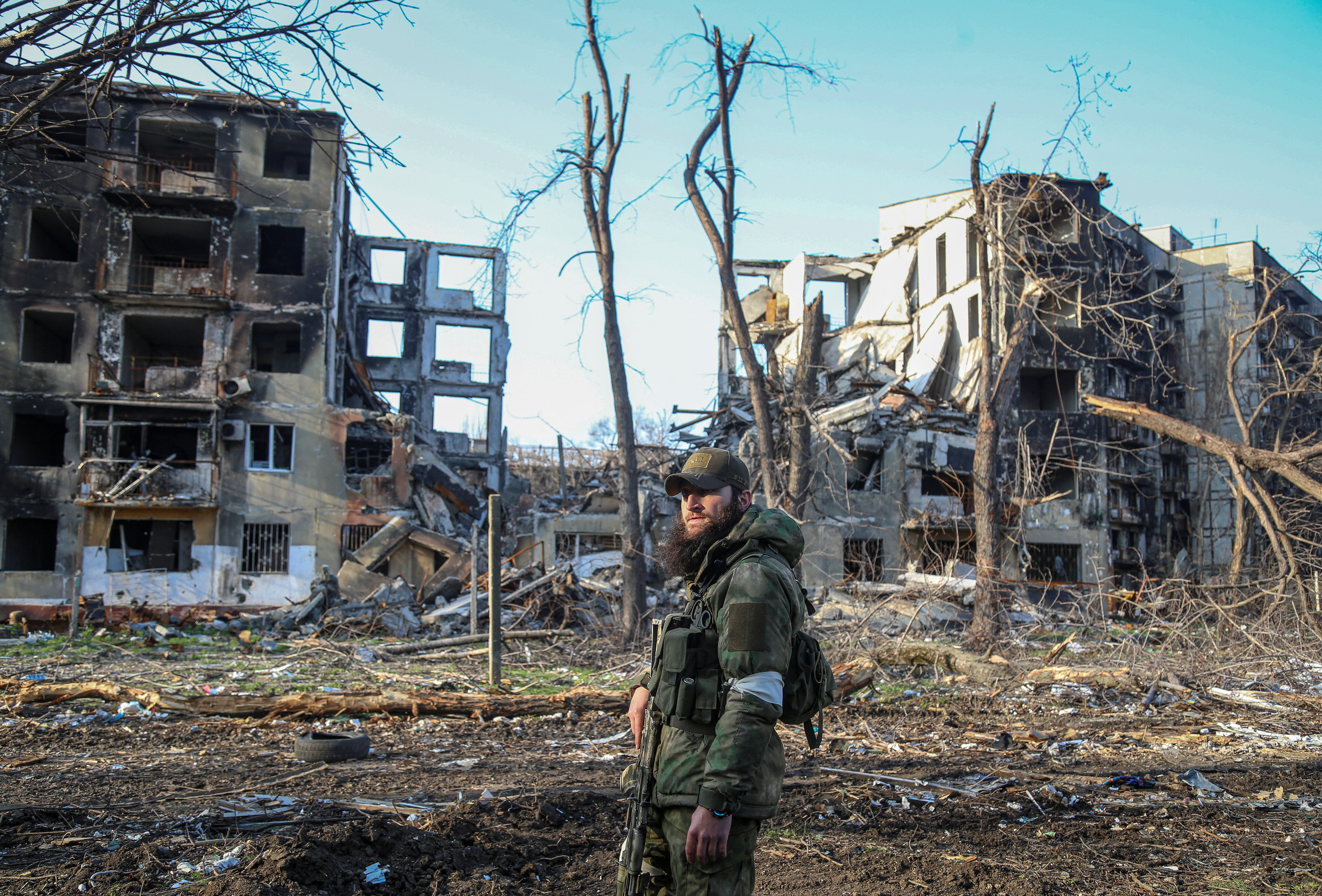 A service member from Chechen Republic looks on during fighting in Ukraine-Russia conflict in Mariupol