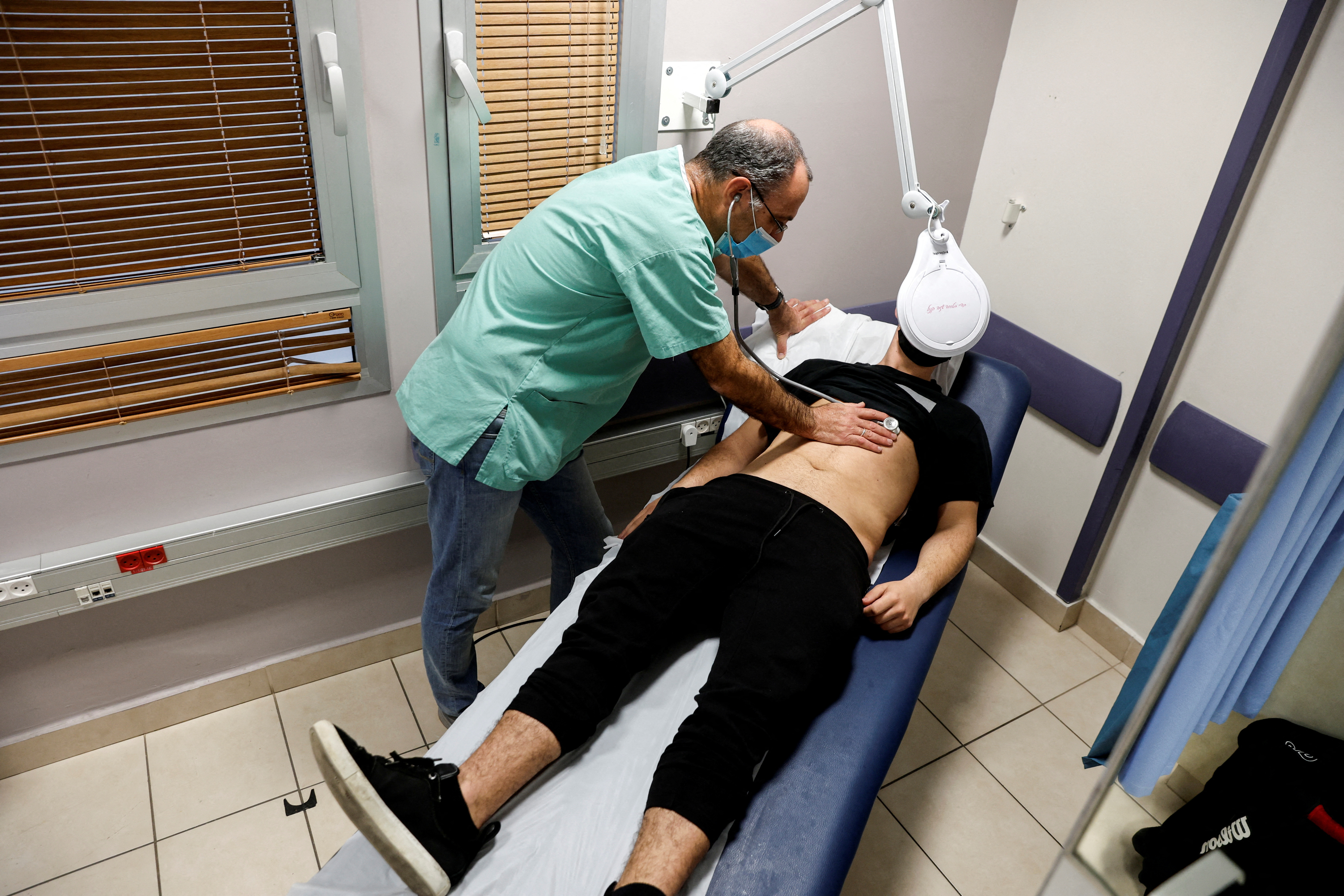 A patient suffering from Long COVID is examined in the post-coronavirus disease (COVID-19) clinic of Ichilov Hospital in Tel Aviv