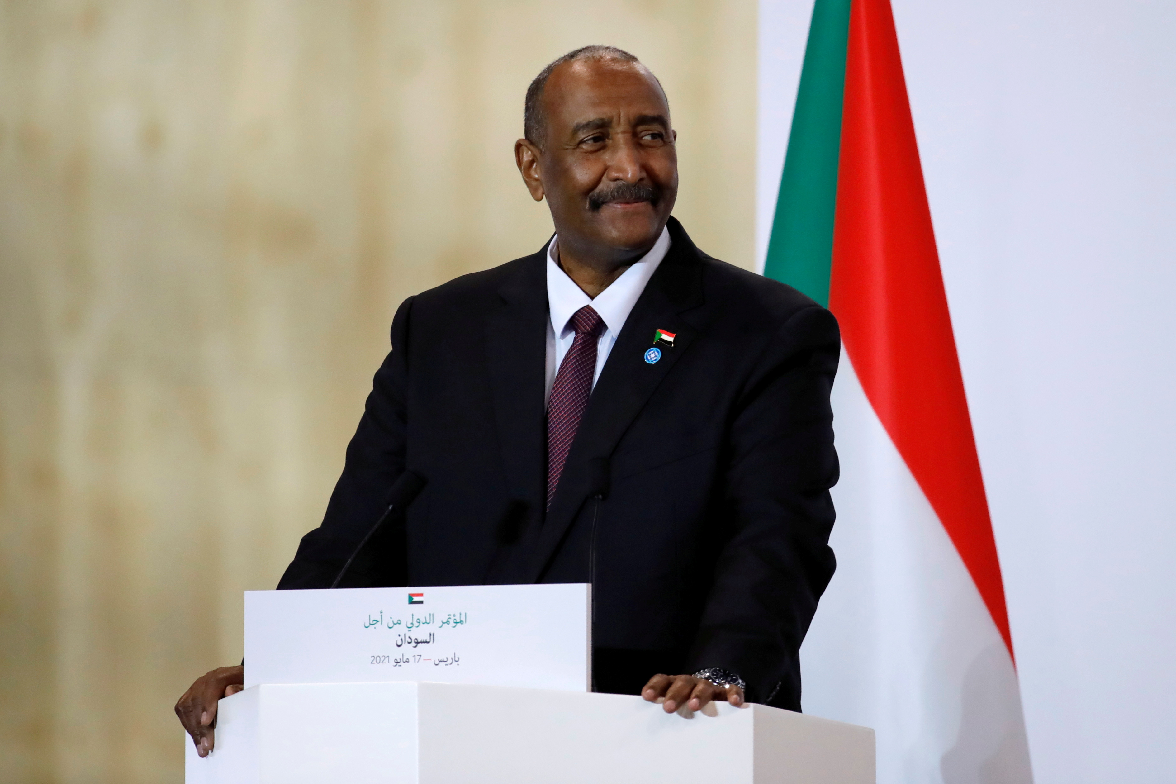 Sudan's Sovereign Council Chief General Abdel Fattah al-Burhan attends a joint news conference with French President Emmanuel Macron and Sudan's Prime Minister Abdalla Hamdok