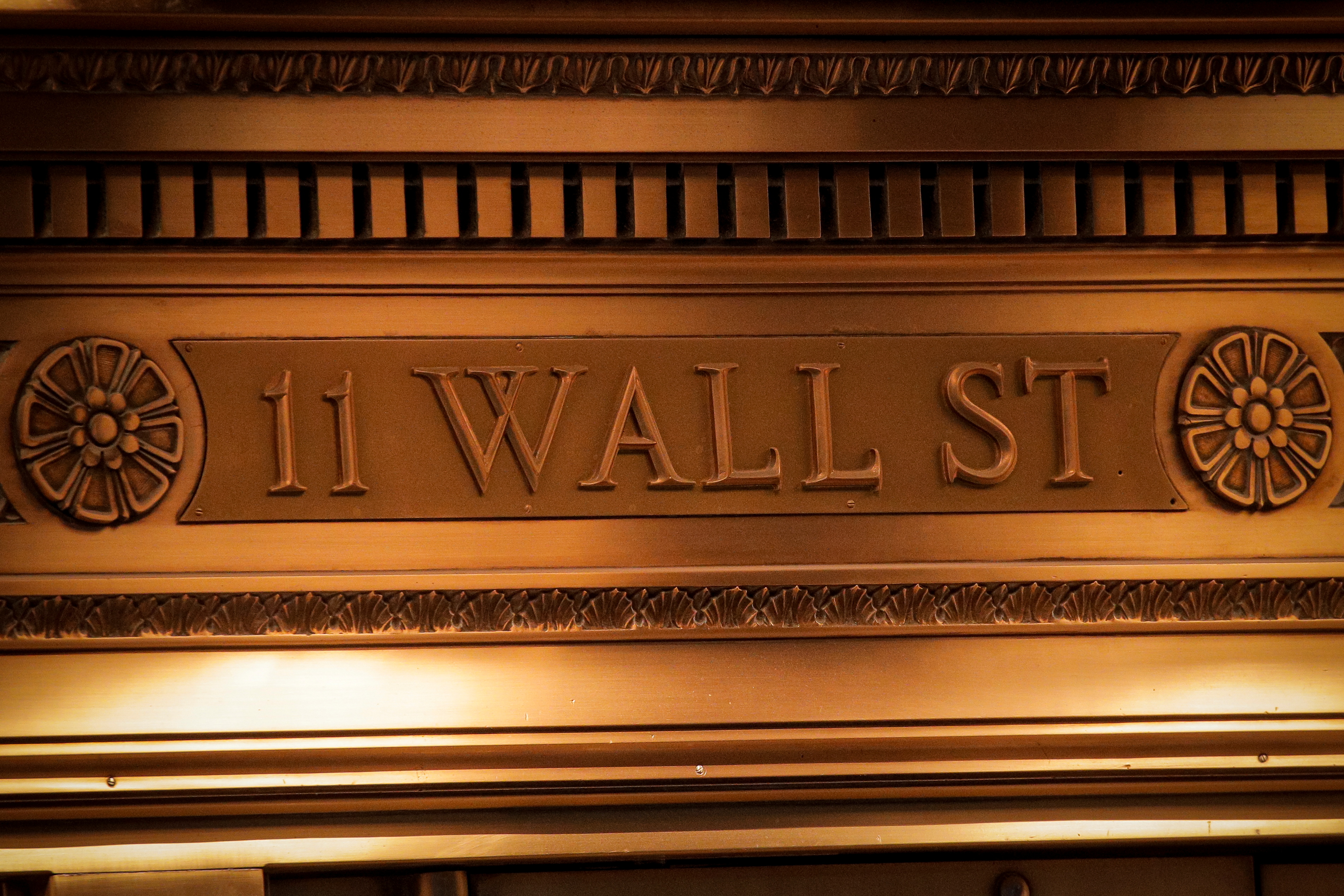 A sign is seen outside the 11 Wall St. entrance of the NYSE in New York