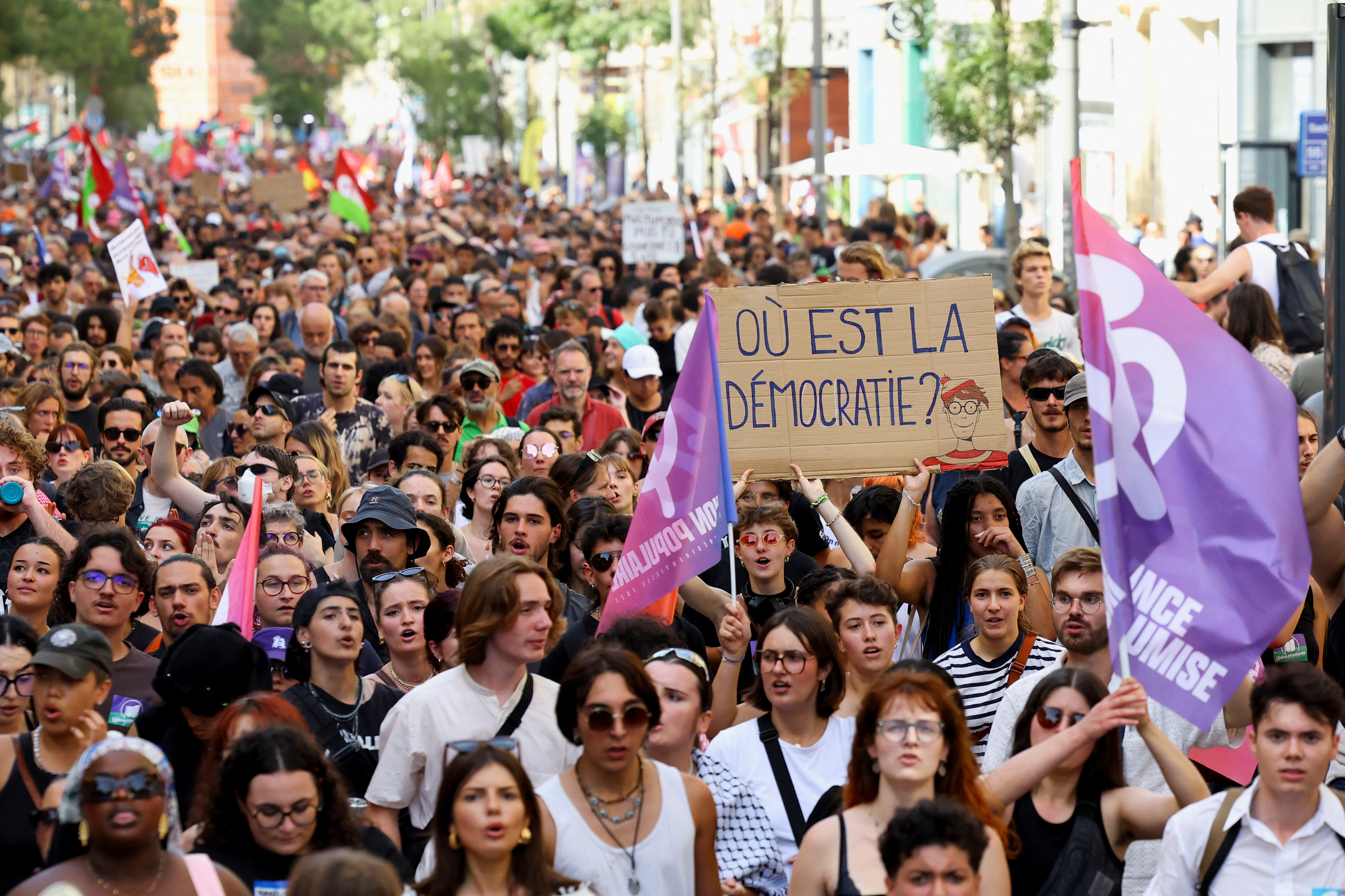 Demonstrators protest Macron's refusal to name leftist PM, in Paris