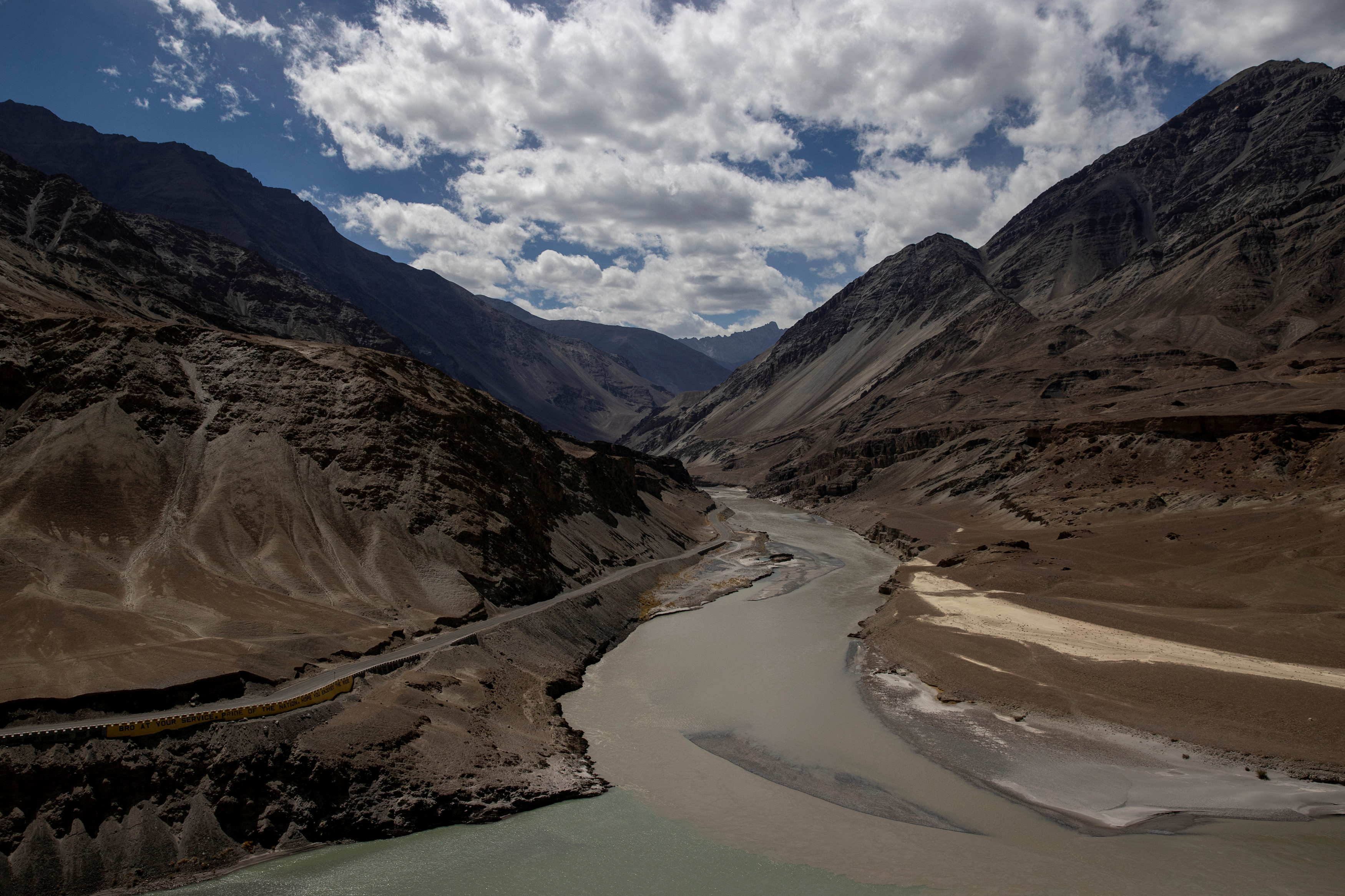 A highway getting constructed by Border Roads Organisation passes by the confluence of the Indus and Zanskhar rivers in the Ladakh region