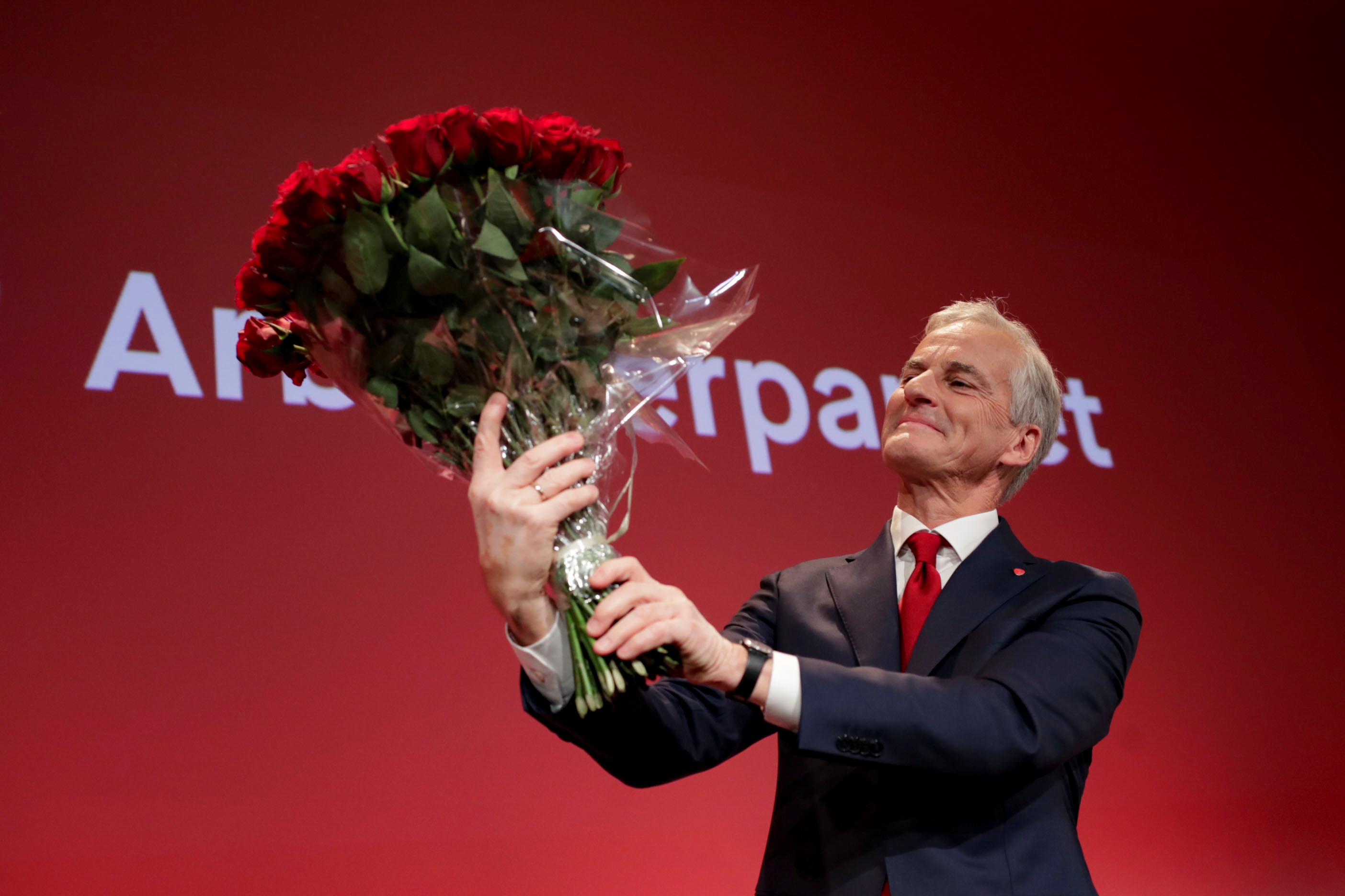 Norway's Labor Party leader Jonas Gahr Stoere holds a bouquet of red roses at the Labor Party's election vigil at the People's House during parliamentary elections in Oslo, Norway September 13, 2021. Javad Parsa/NTB via REUTERS   