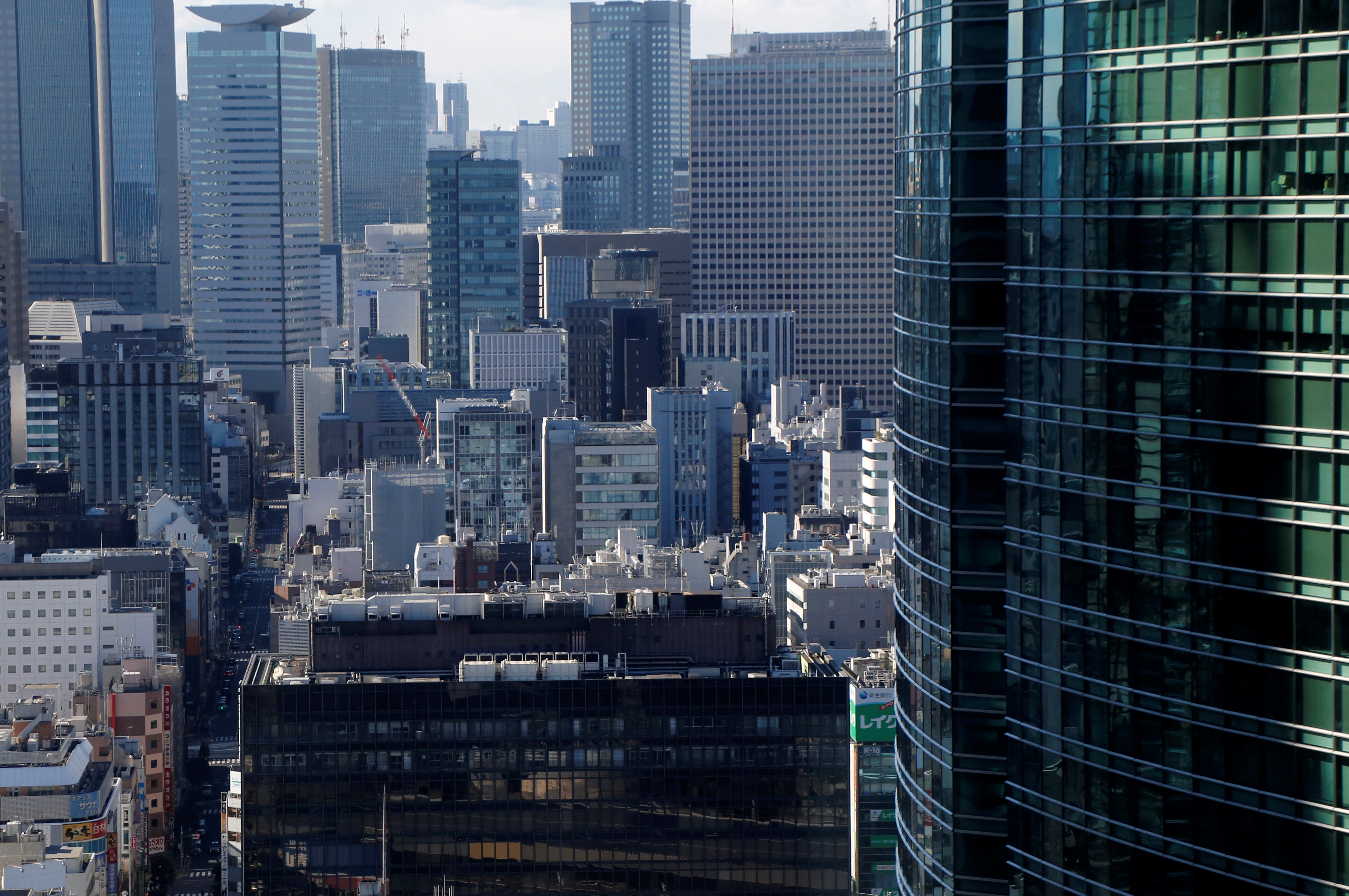 Office buildings are pictured at a business district in Tokyo, Japan, February 12, 2017. Picture taken February 12, 2017.  REUTERS/Toru Hanai