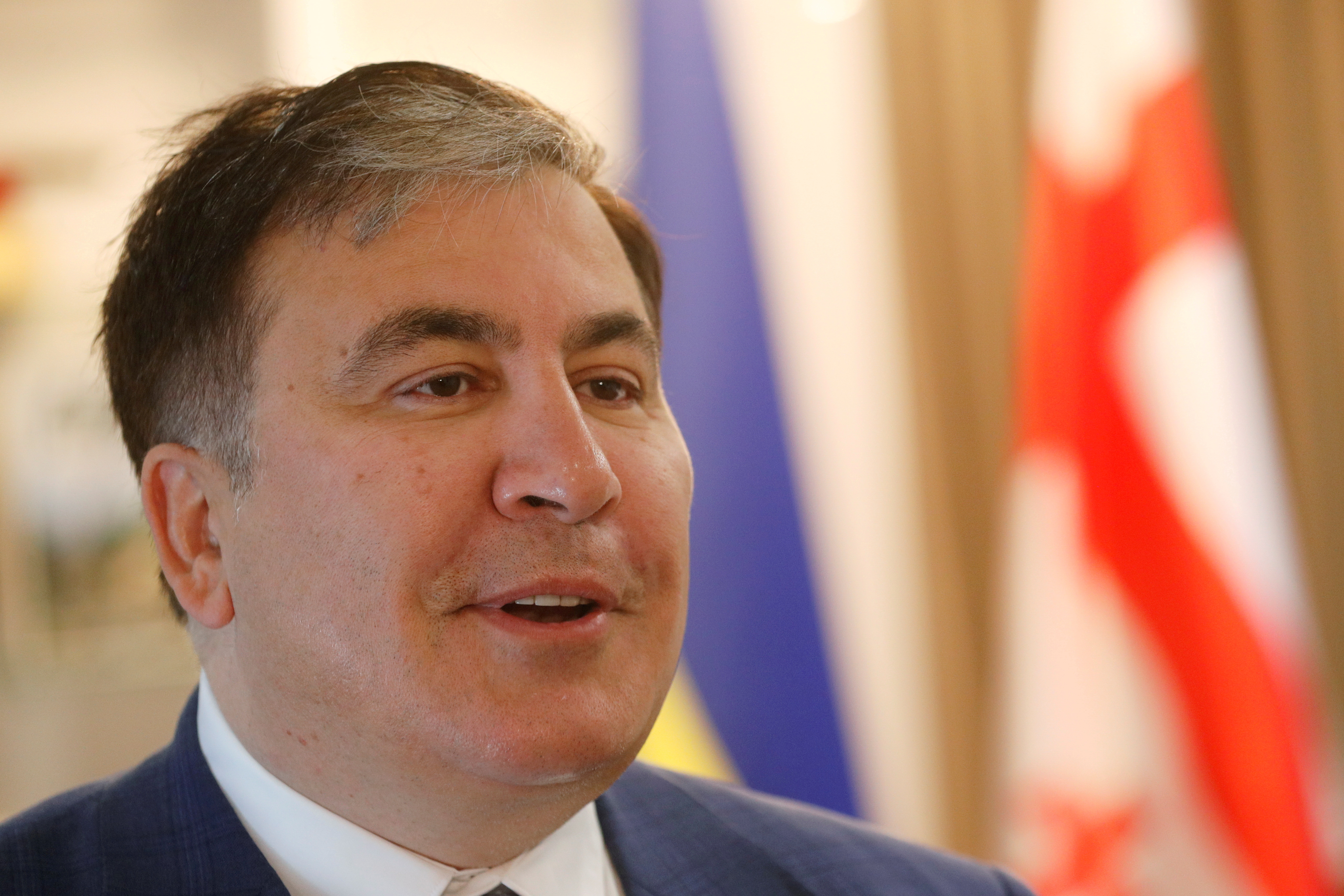 Mikheil Saakashvili, Georgia's former president and newly appointed head of the executive committee of Ukraine's National Reform Council attends an interview outside Kiev