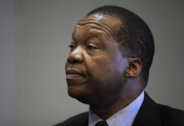 Reserve Bank of Zimbabwe Governor John Mangudya listens to questions during an interview in Harare