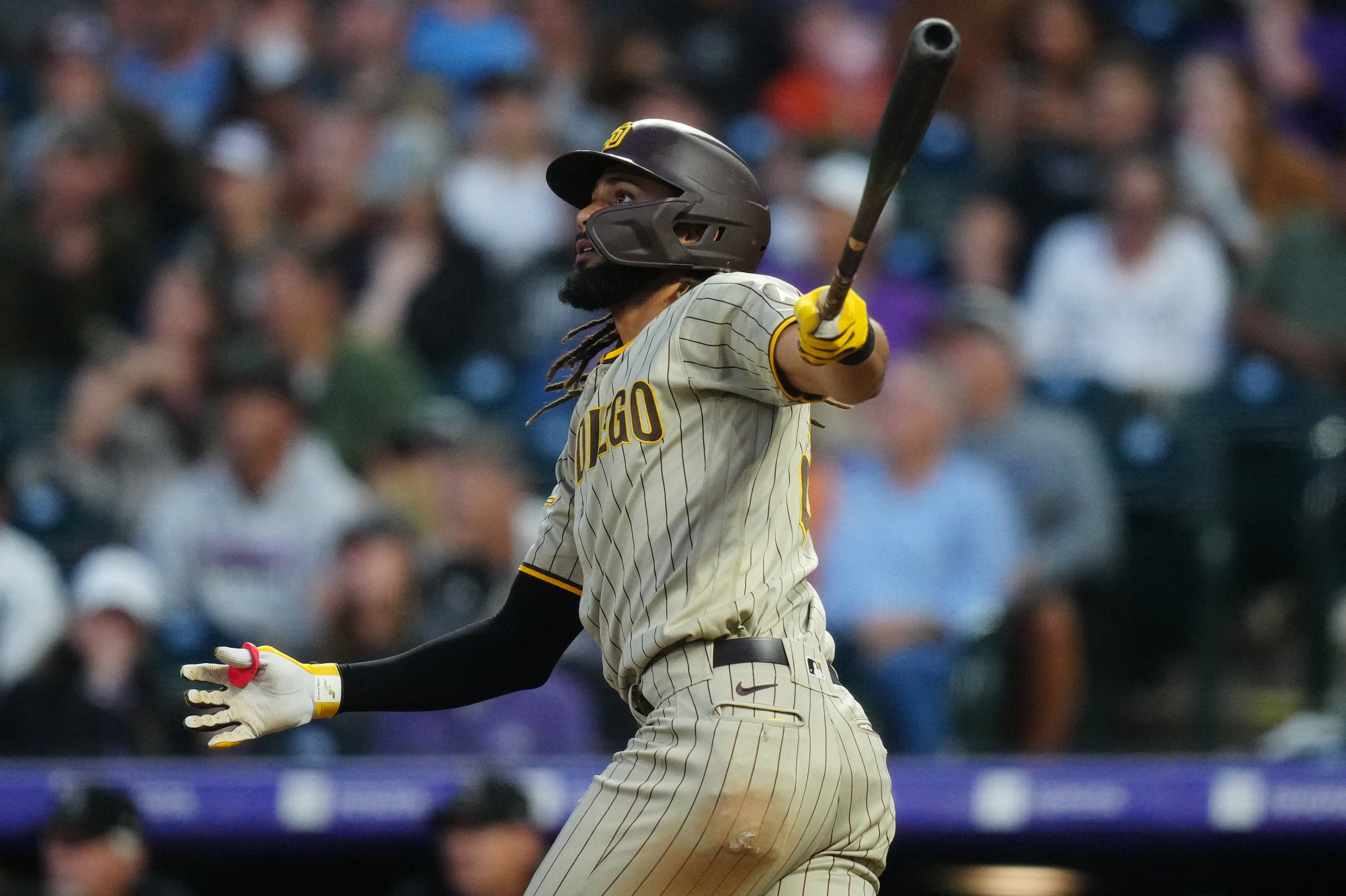 Padres sock five homers in victory over Rockies