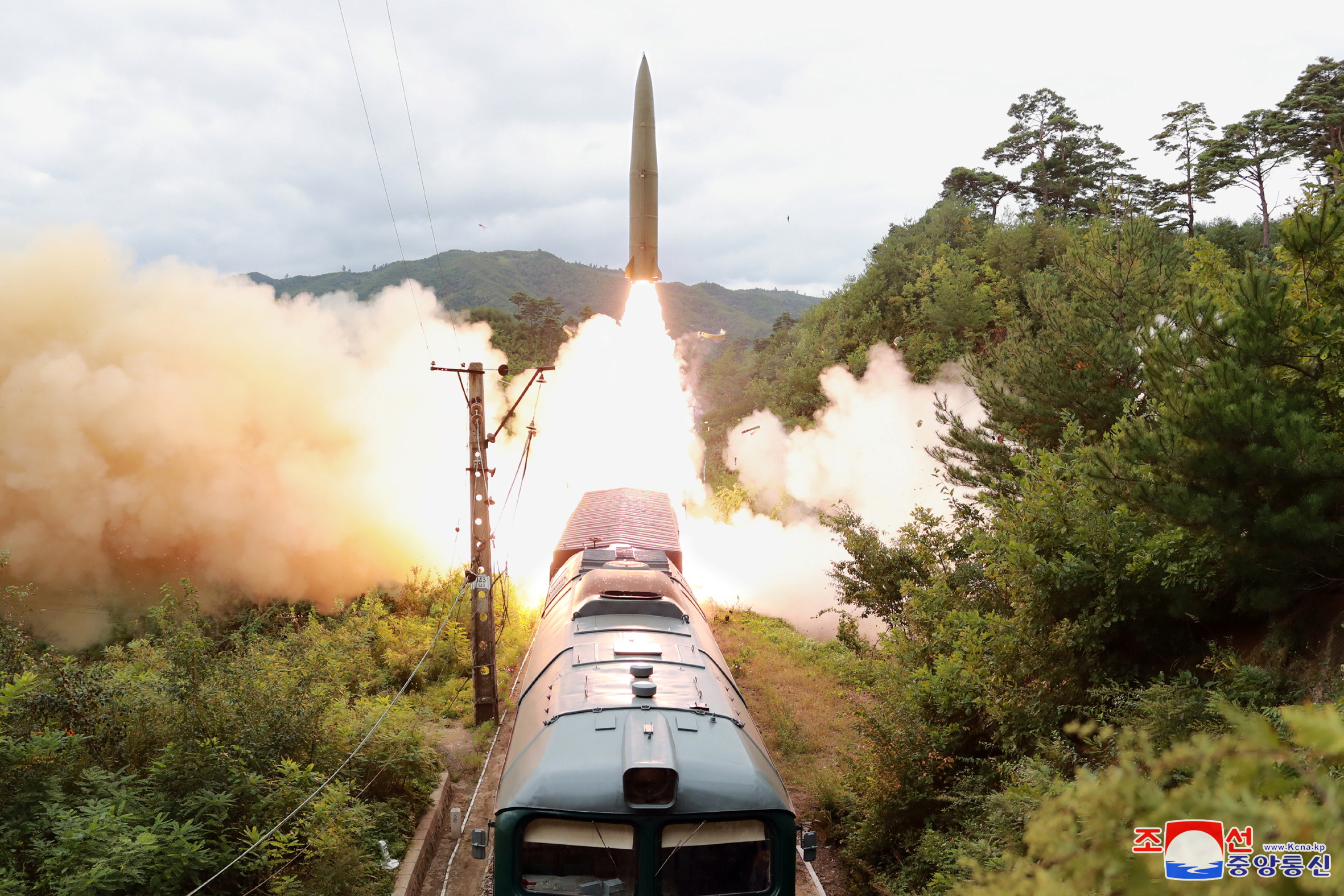 A missile is seen launched during a drill of the Railway Mobile Missile Regiment in North Korea