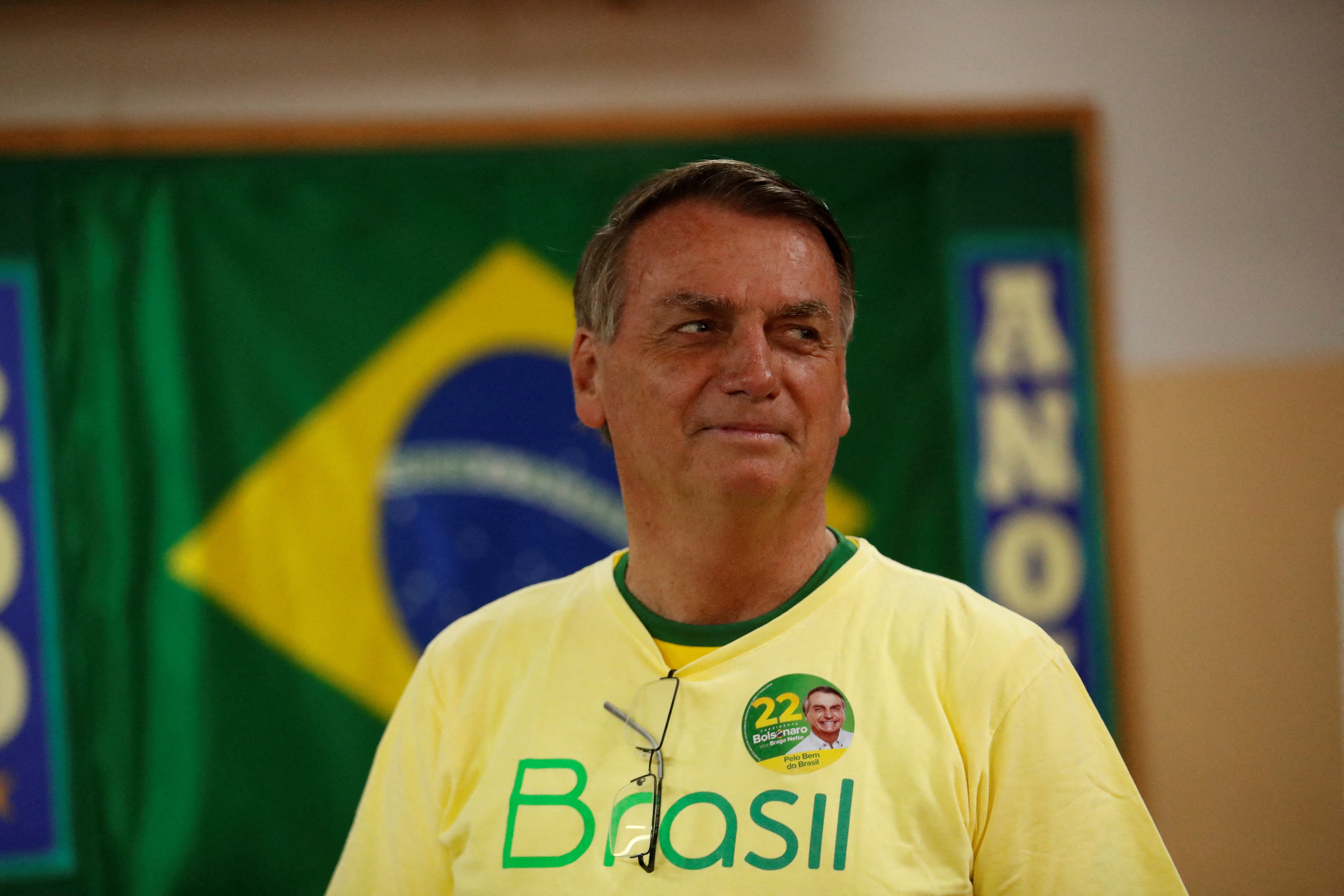 Brazilian President and presidential candidate Jair Bolsonaro gestures as he votes during the second round of the presidential election in Rio de Janeiro,