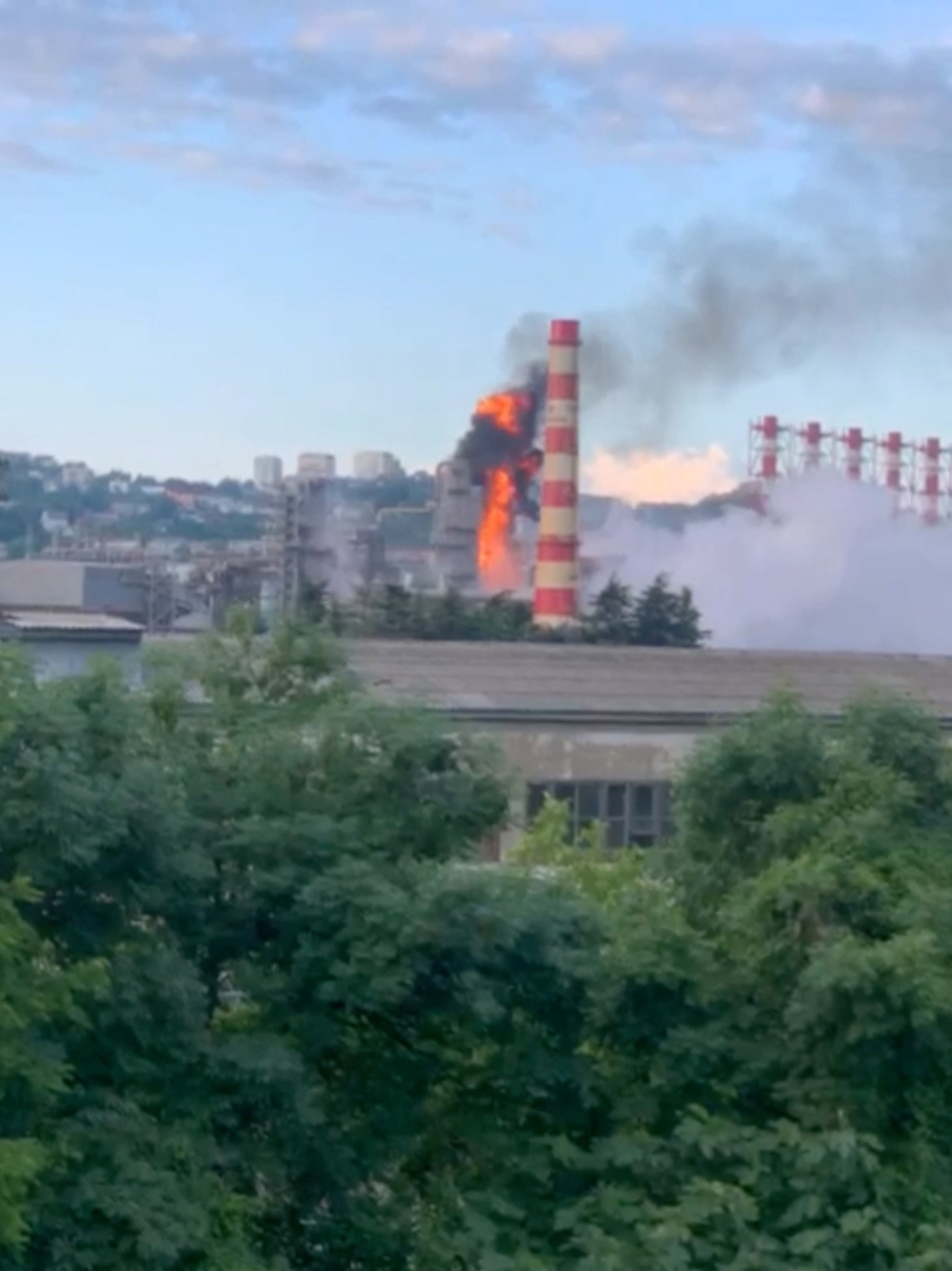 Smoke and fire rise from a refinery after a drone attack in Tuapse