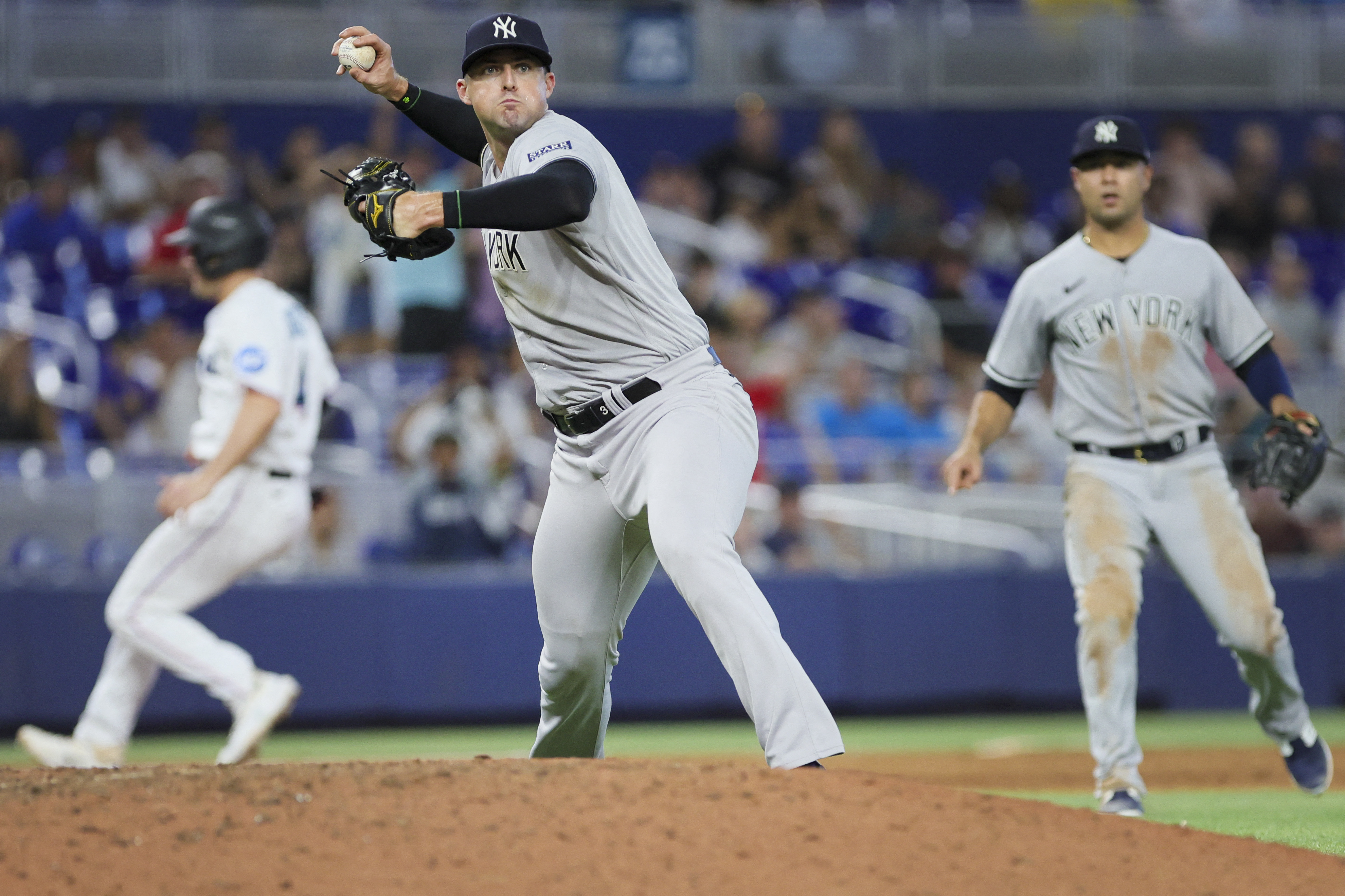 Jake Burger's triple caps Marlins' five-run ninth to beat Yankees