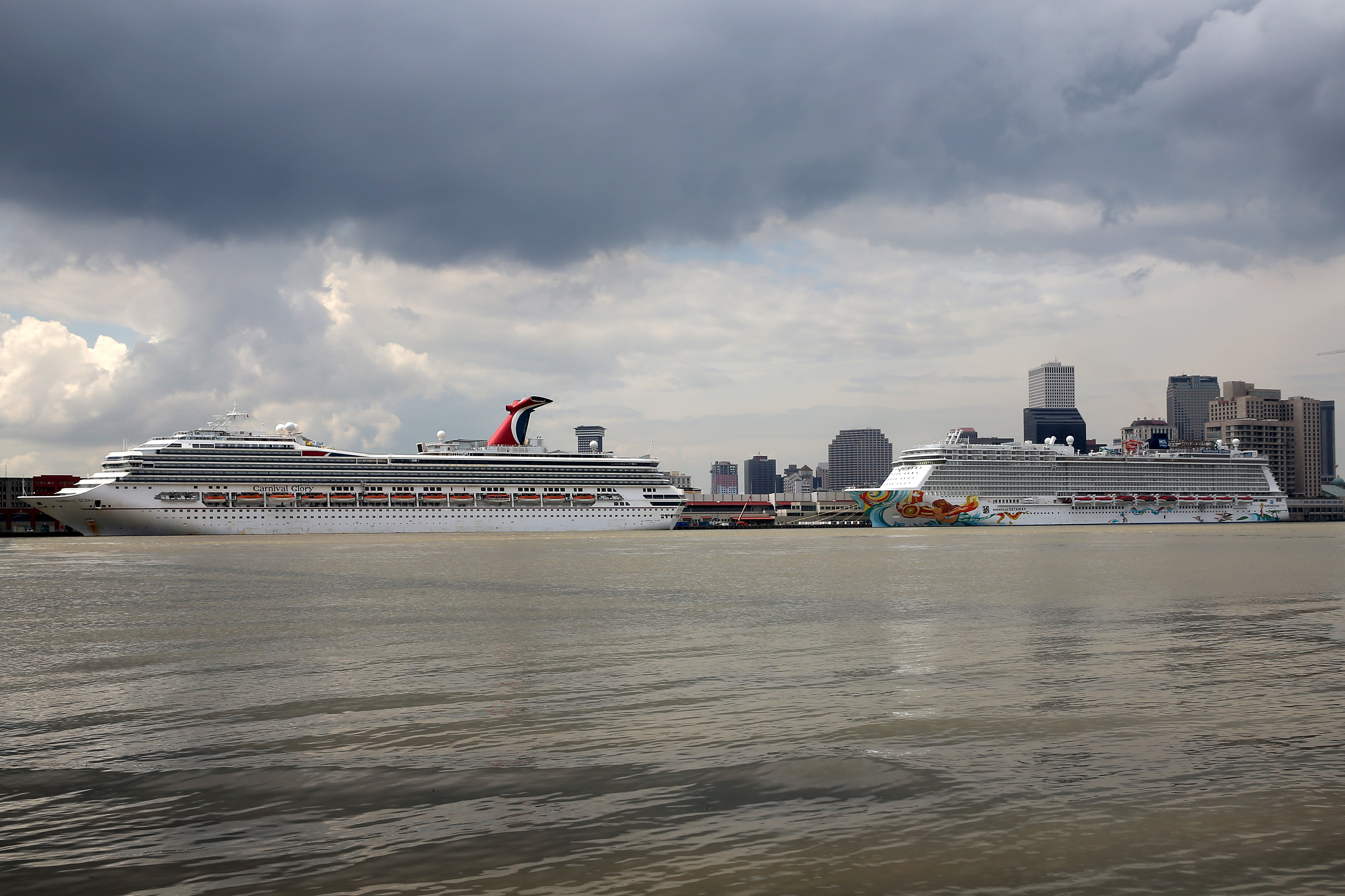 Cruise ships are pictured on the Mississippi River in New Orleans