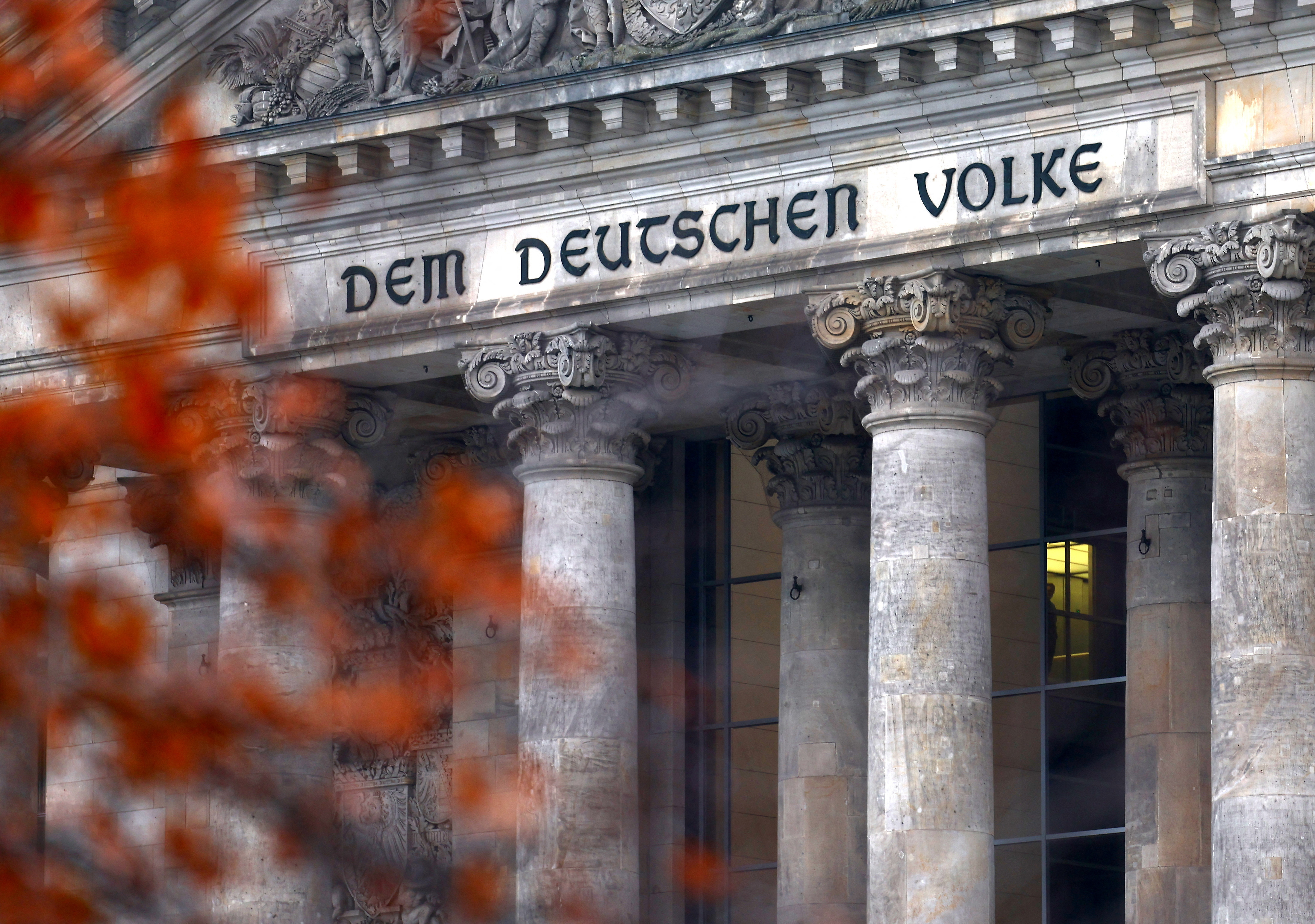 The inscription 'To the German people' is written above the entrance of Reichstag building in Berlin