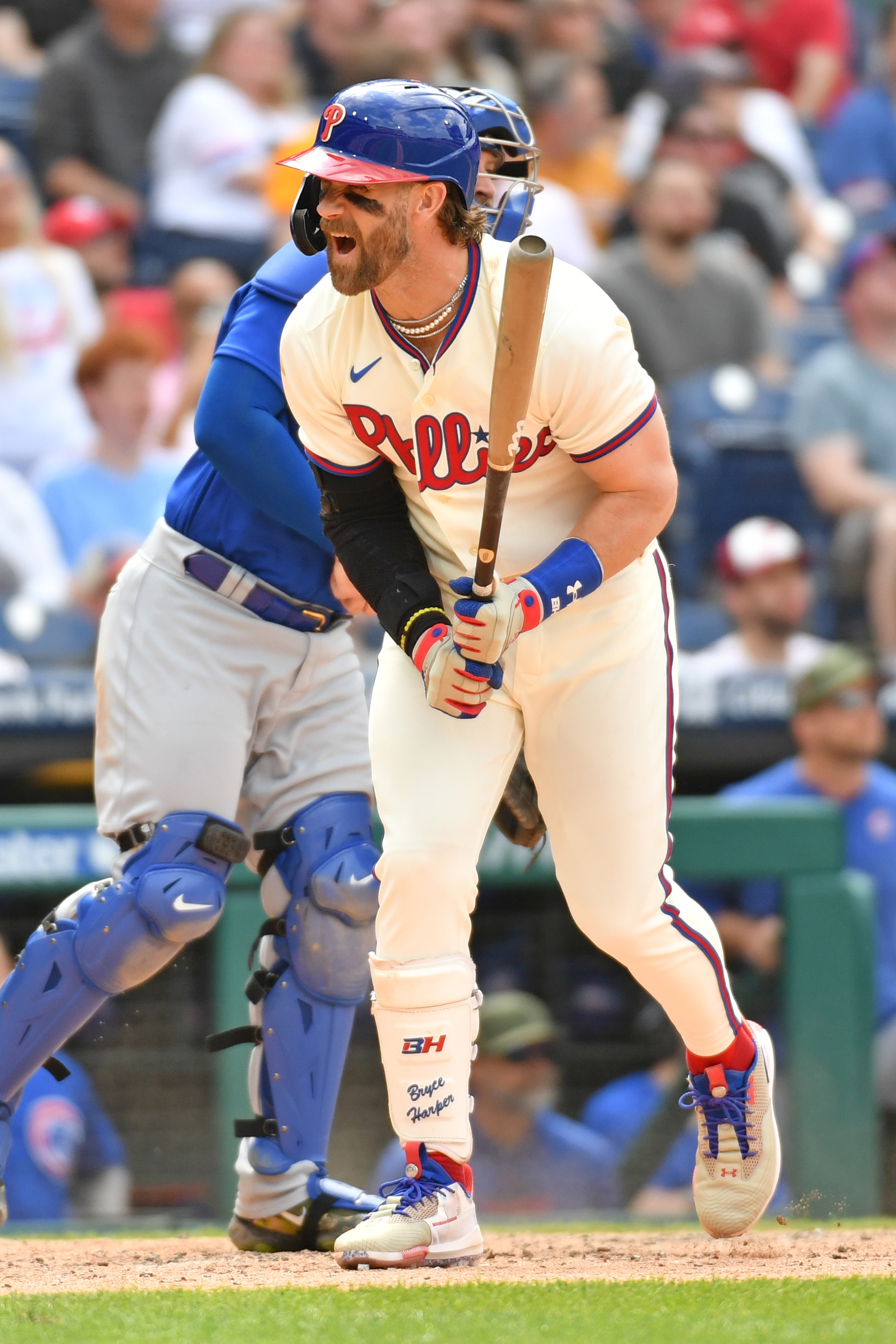 Phillies 'relieved' Bryson Stott OK after taking pitch to elbow; tight back  keeps Bryce Harper at DH