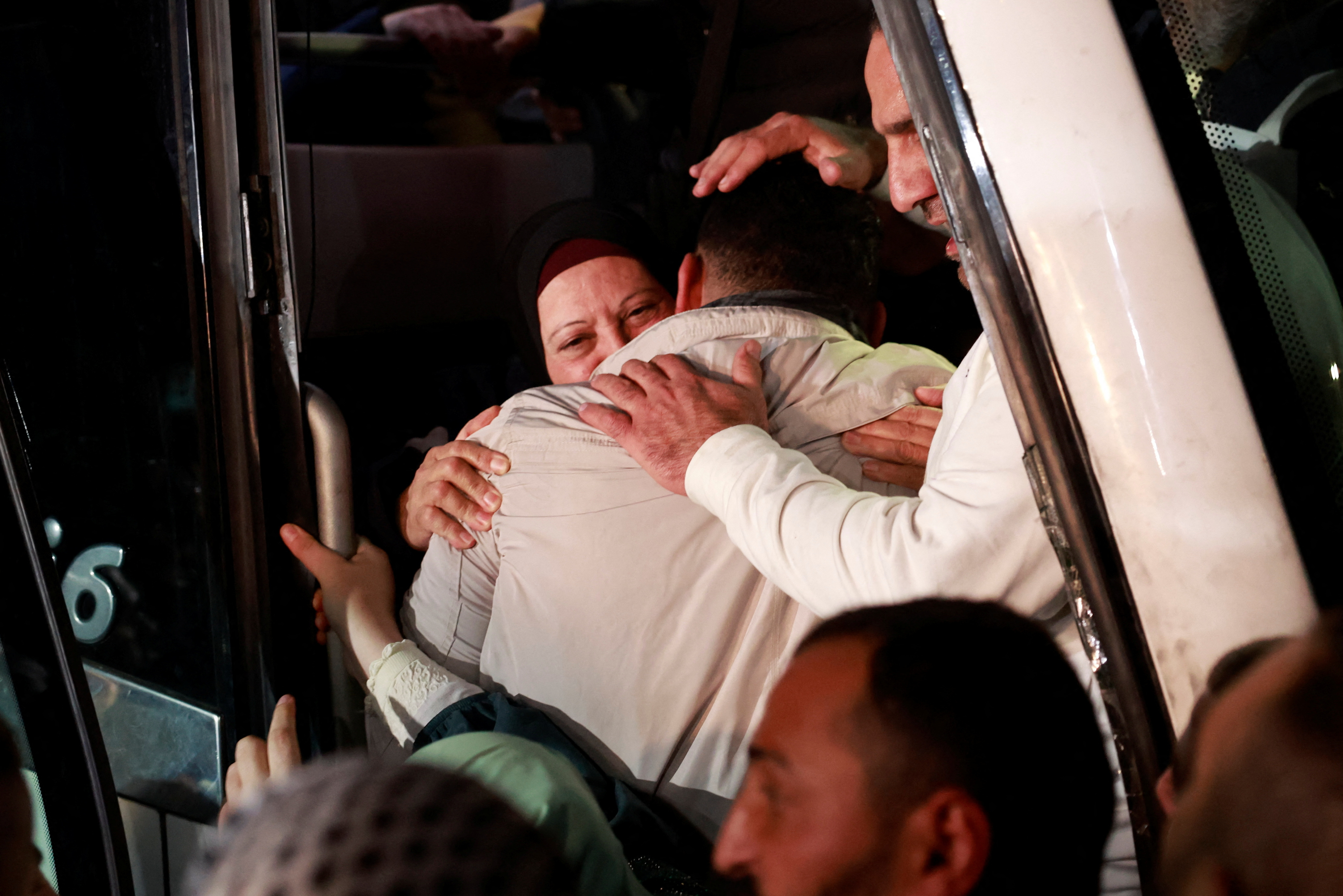 A Palestinian prisoner reacts after being released amid a hostages-prisoners swap deal between Hamas and Israel
