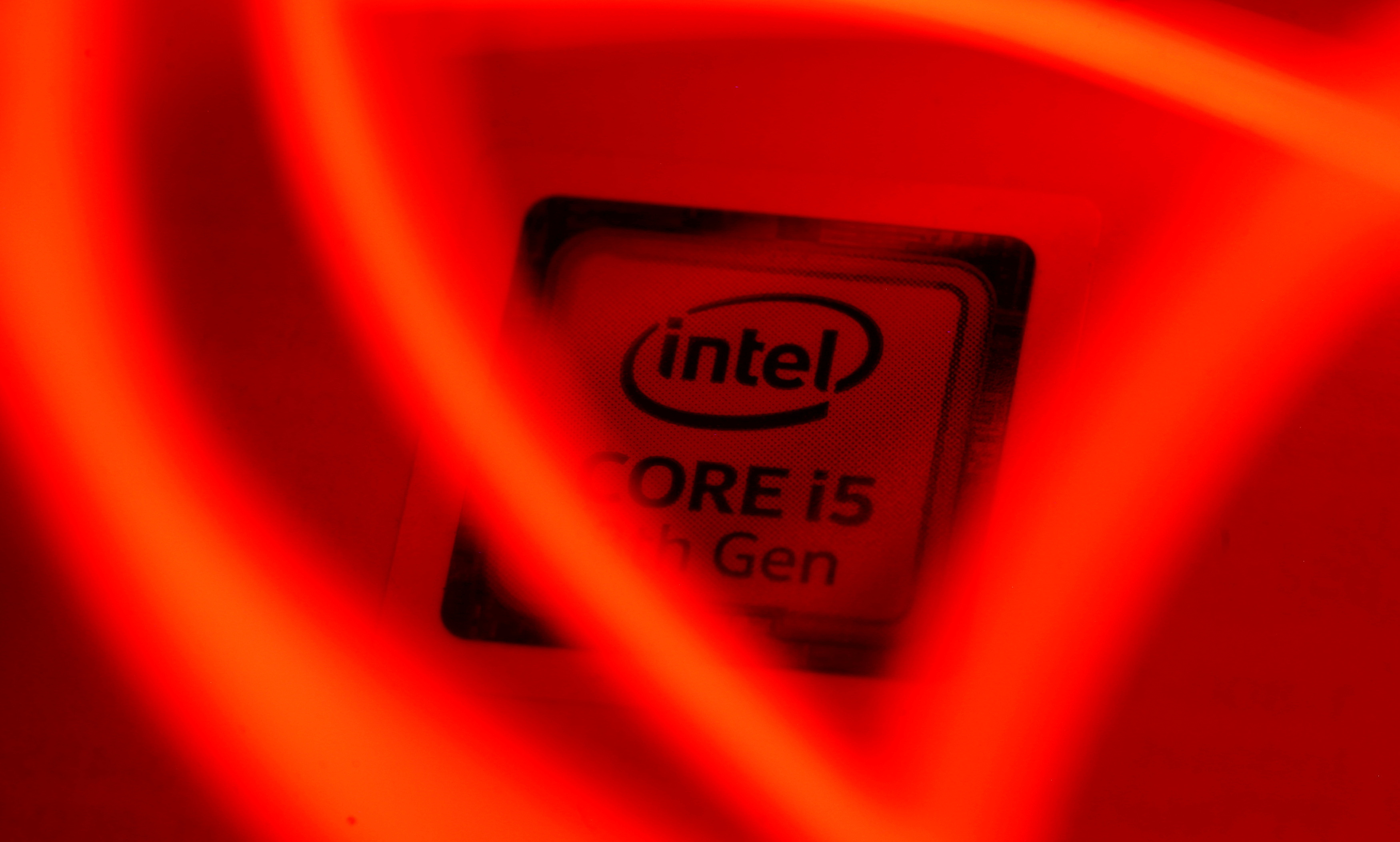 The Intel logo is seen behind LED lights in this illustration