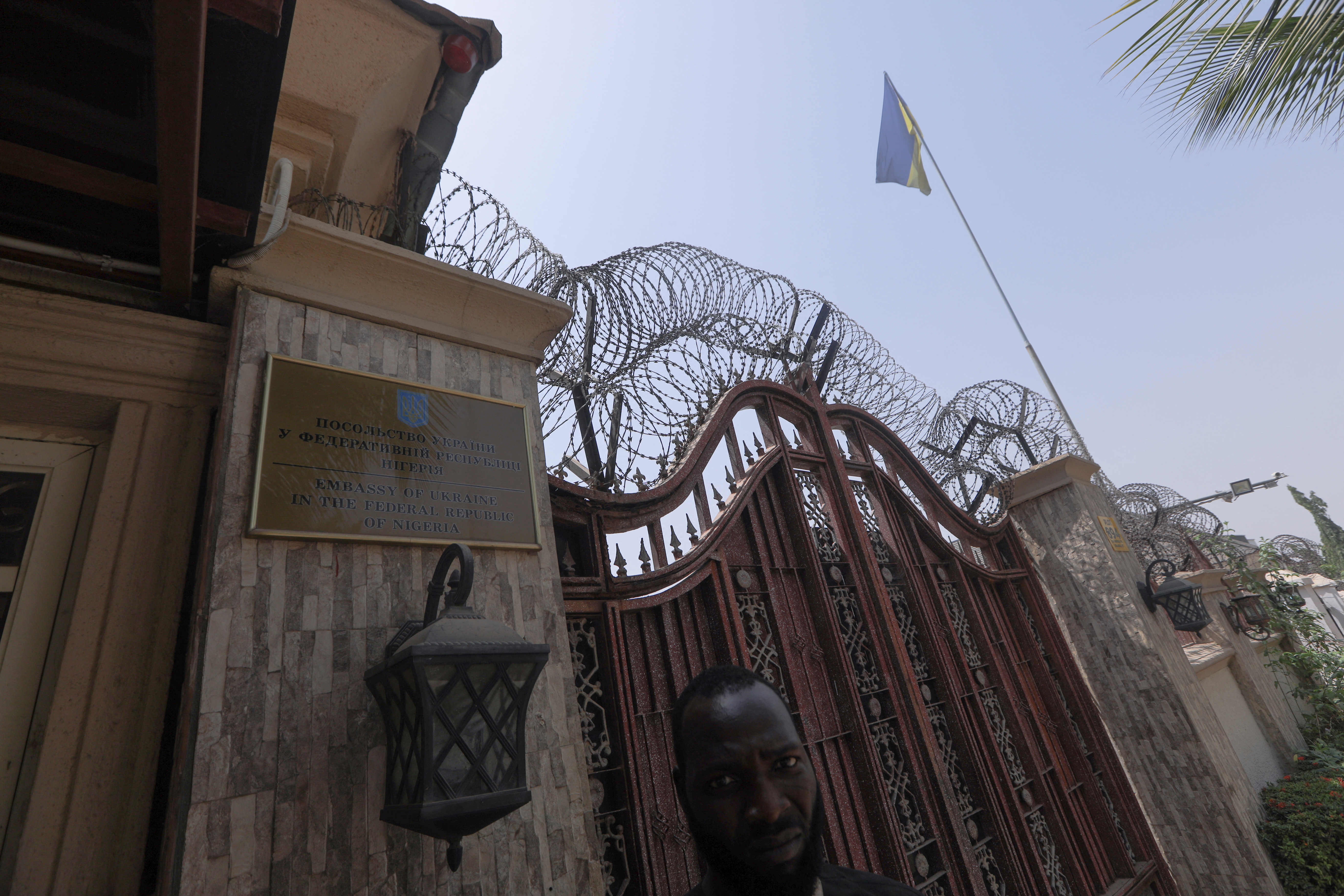 A Ukrainian flag is seen flying at the embassy in Abuja, Nigeria February 25, 2022. REUTERS/ Afolabi Sotunde