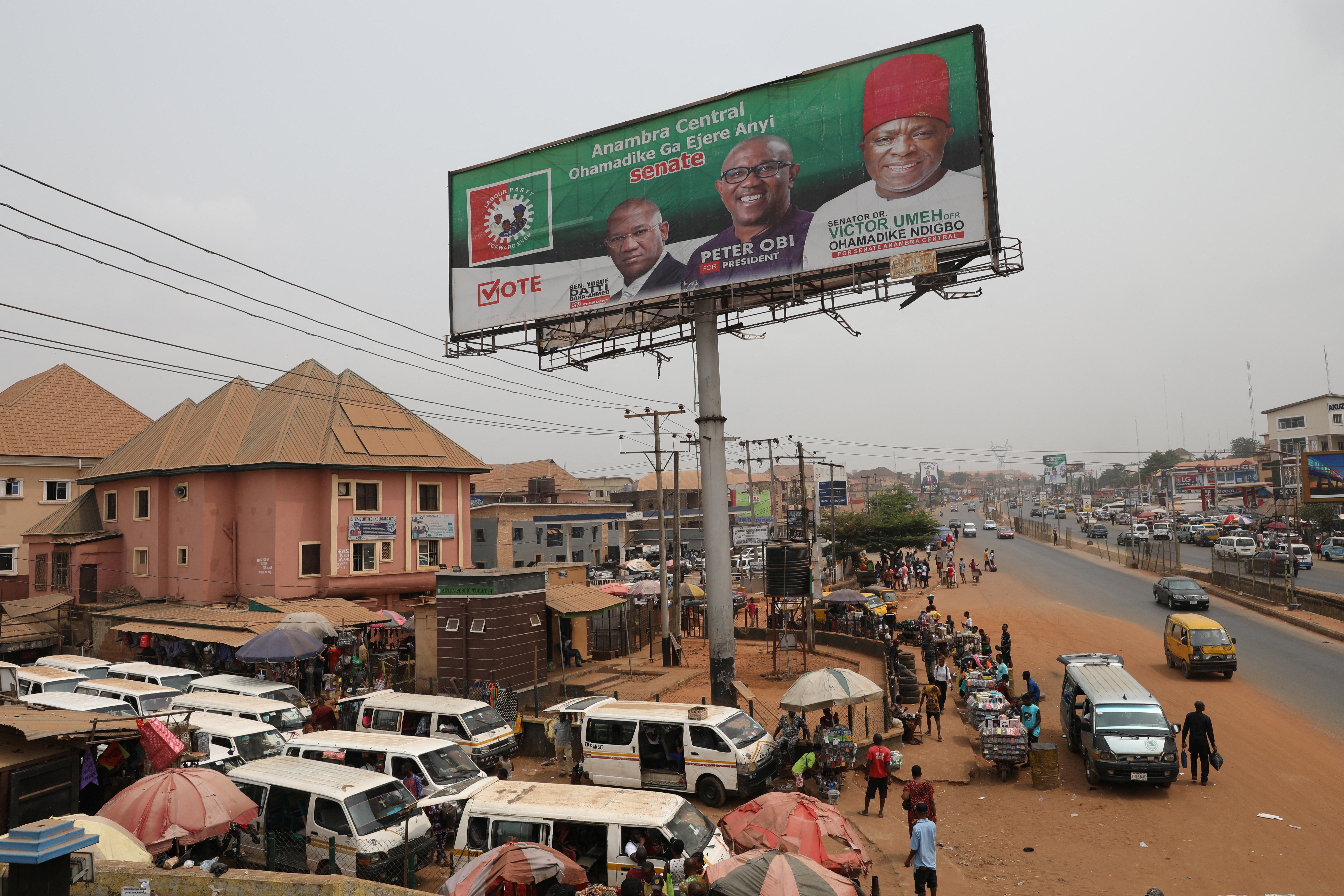 A campaign billboard depicting Labour Party (LP) Presidential candidate, Peter Obi, is seen at a bus-stop, ahead of Nigeria's Presidential election in Awka