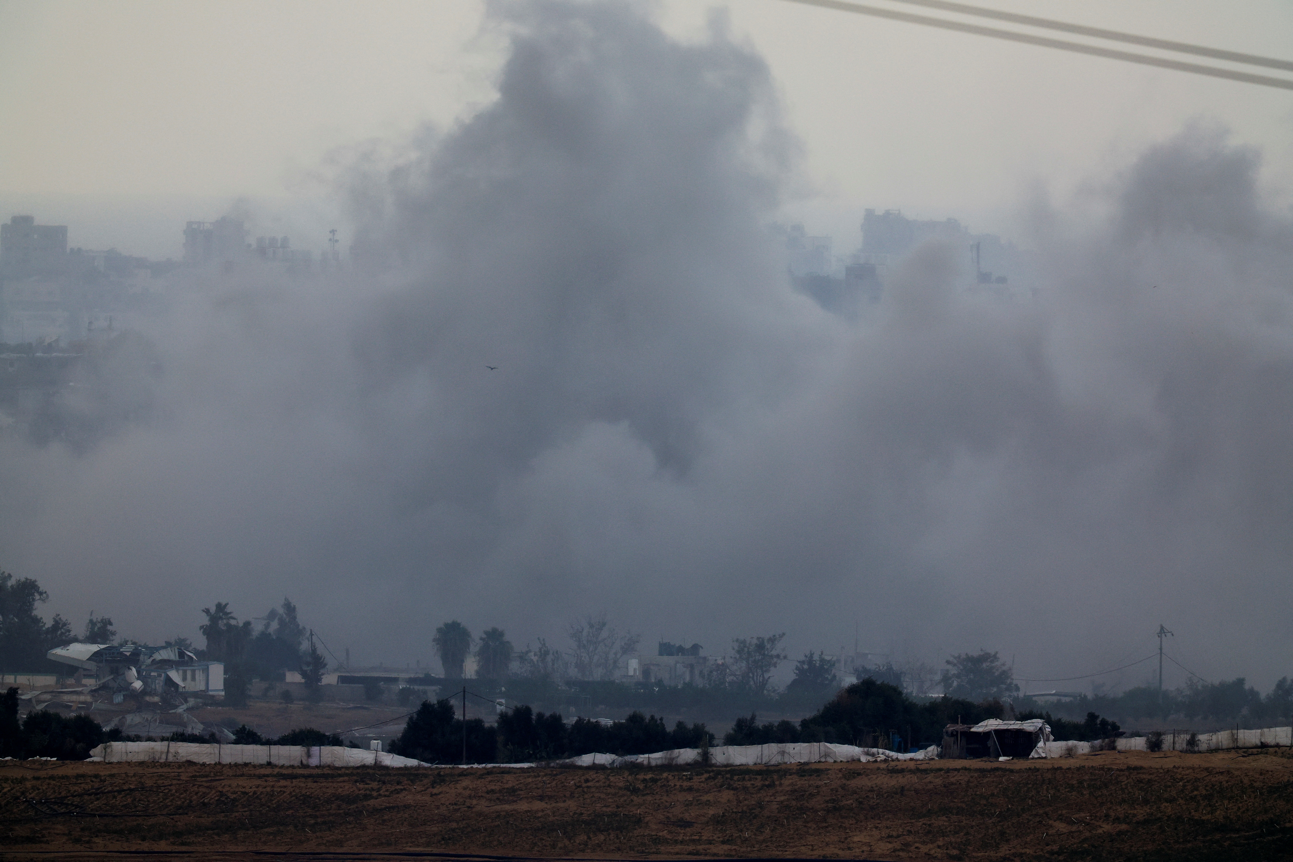 Smoke rises after an explosion in northern Gaza, as seen from southern Israel
