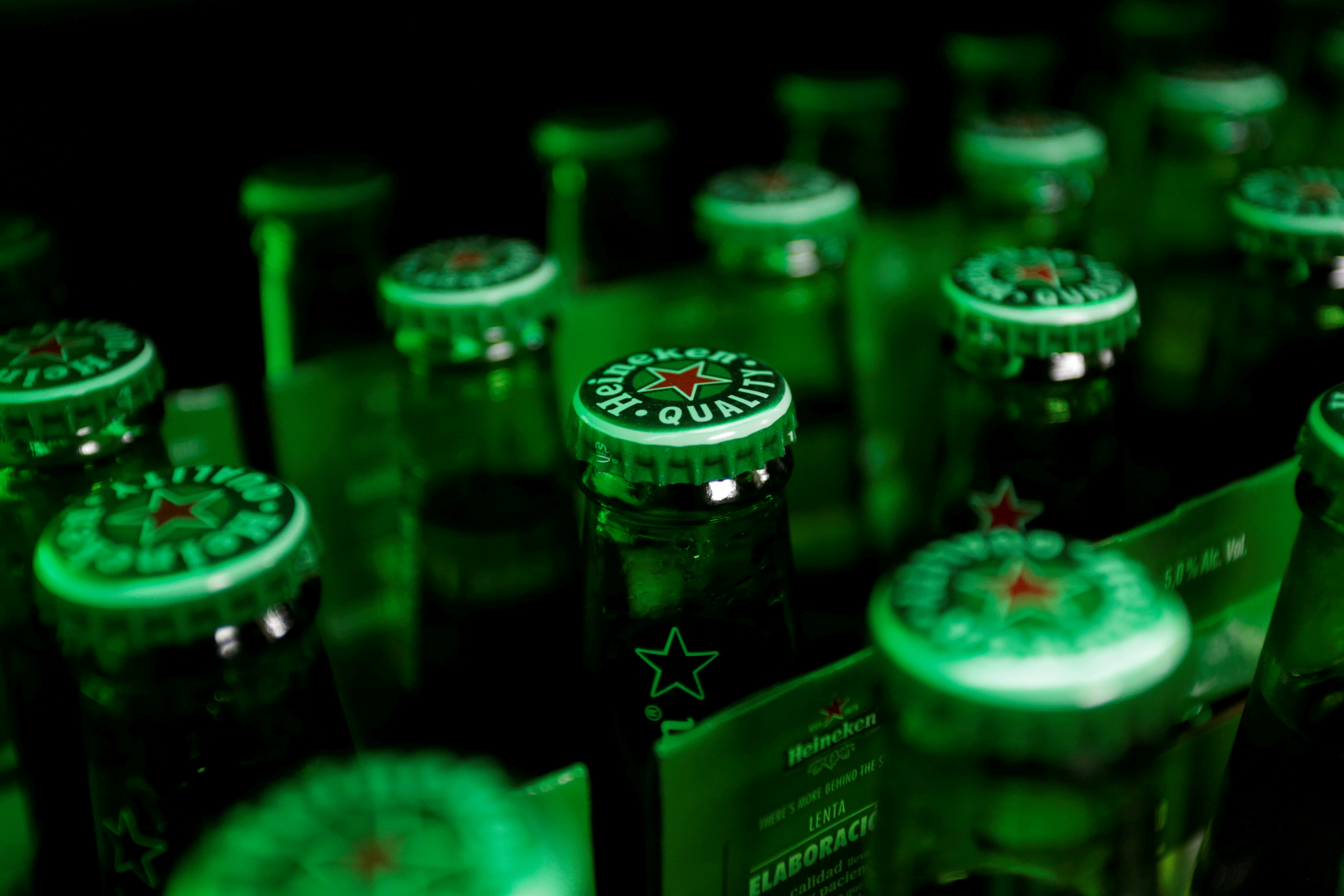 Heineken beer bottles are seen at a bar in Monterrey