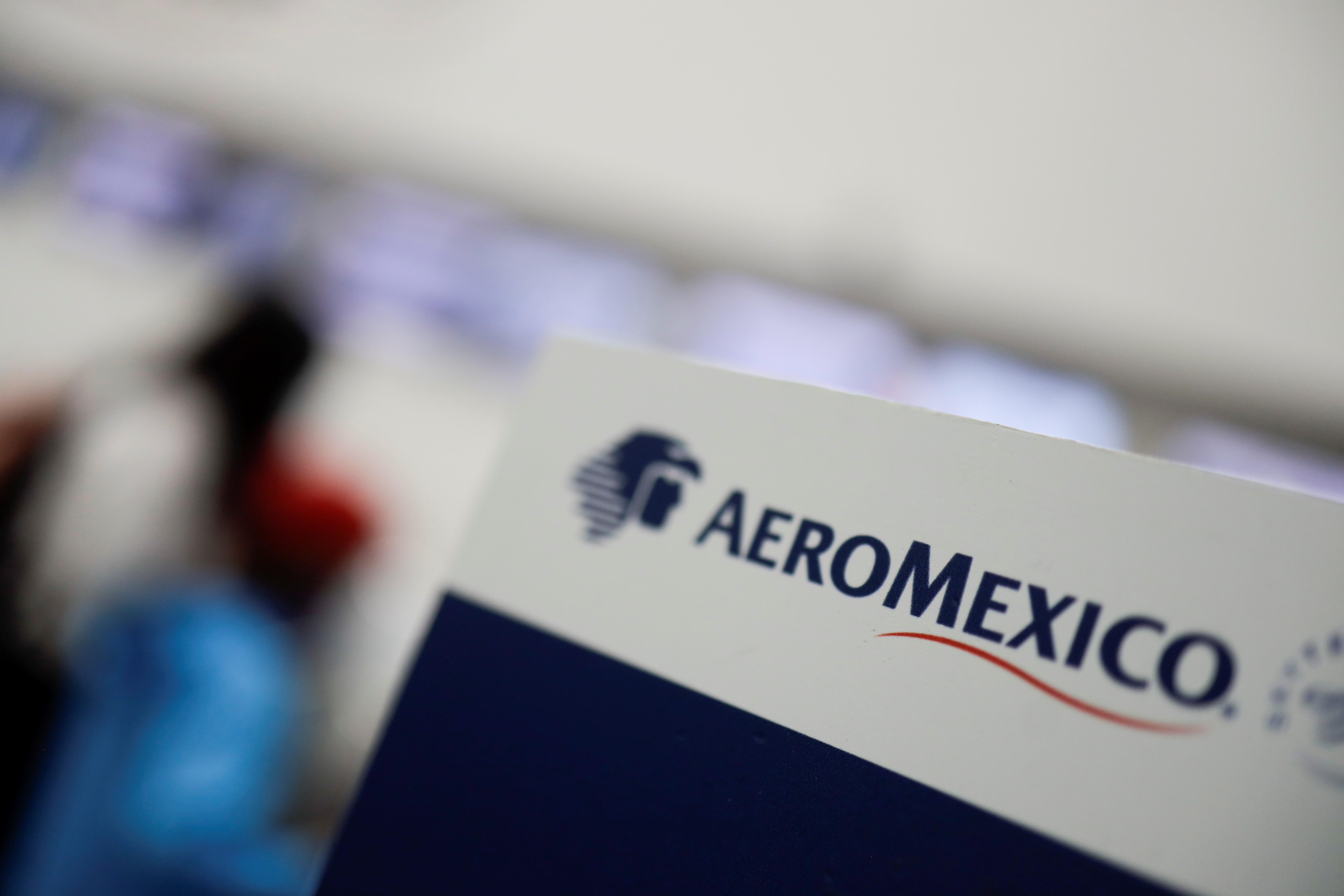 The logo of Mexican airline Aeromexico is pictured on a sign at the Benito Juarez International airport in Mexico City