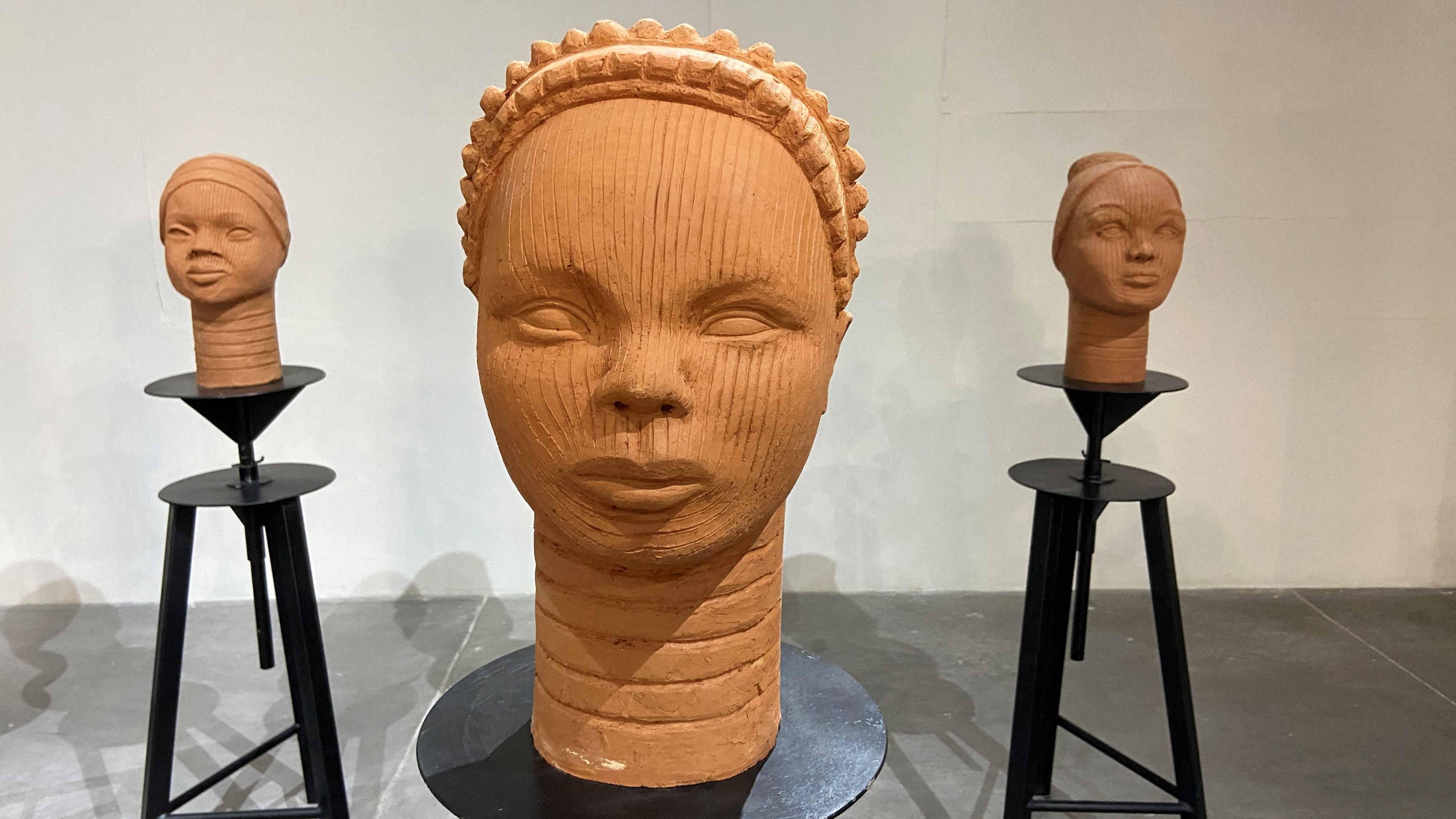 Missing Chibok girls sculpted in clay in Nigeria art project | Reuters