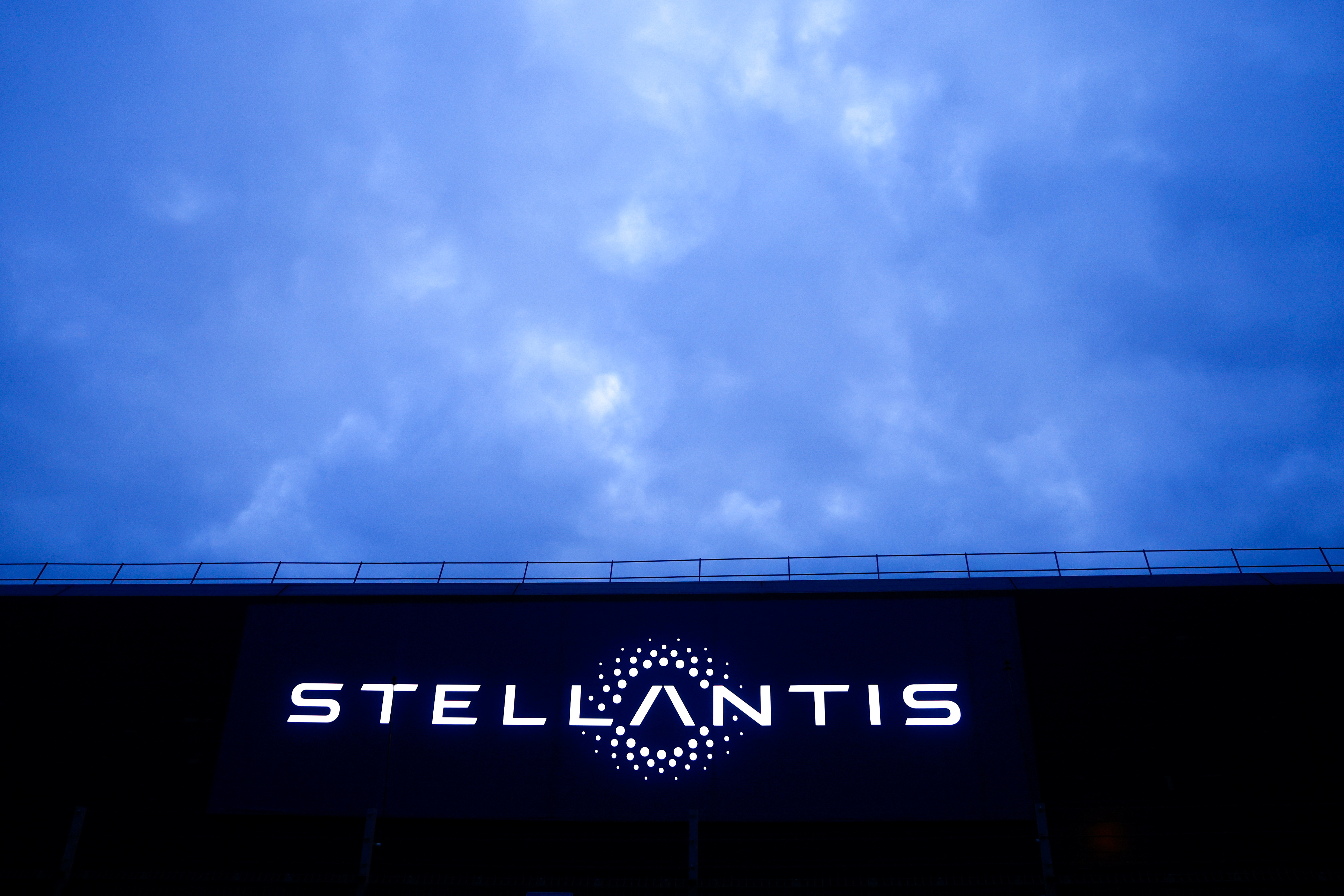 The logo of Stellantis is seen on a company's building in Velizy-Villacoublay near Paris