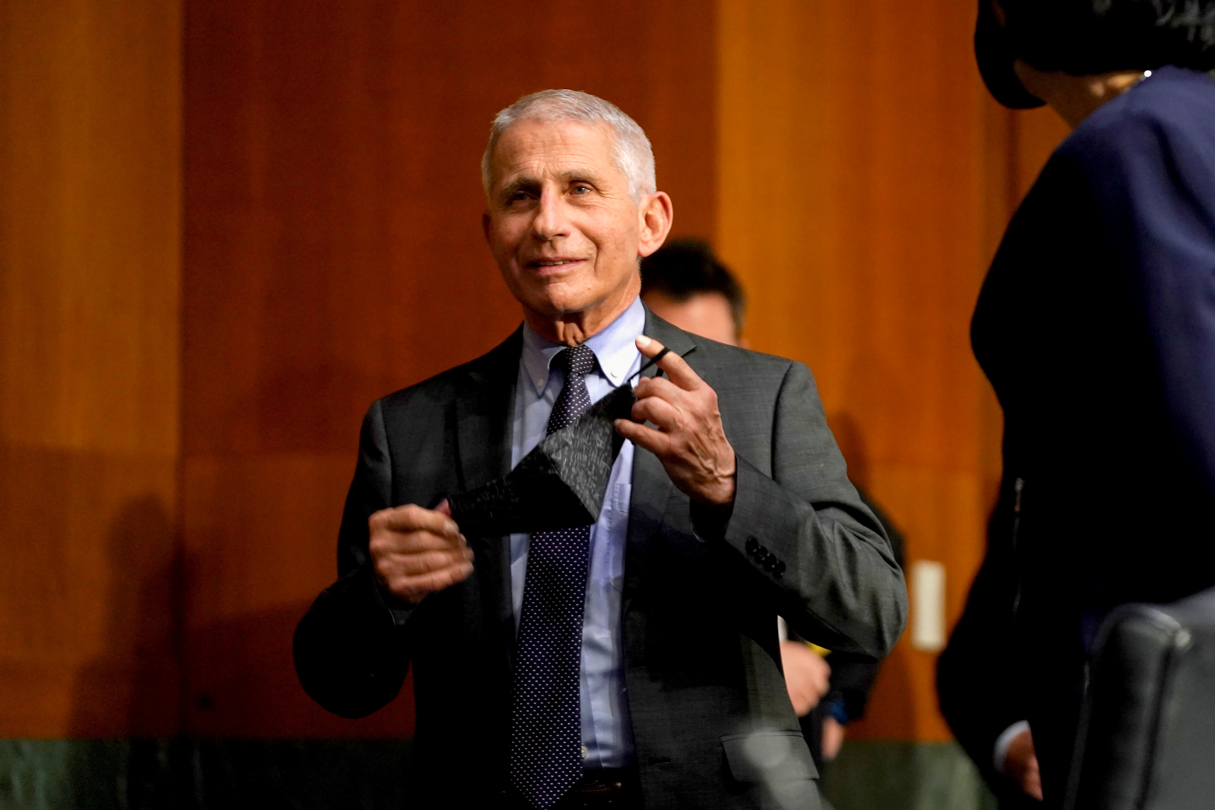 Dr. Anthony Fauci, director of the National Institute of Allergy and Infectious Diseases, arrives for a Senate Health, Education, Labor and Pensions Committee hearing to discuss the on-going federal response to COVID-19, at the U.S. Capitol in Washington, D.C., U.S., May 11, 2021. Greg Nash/Pool via REUTERS